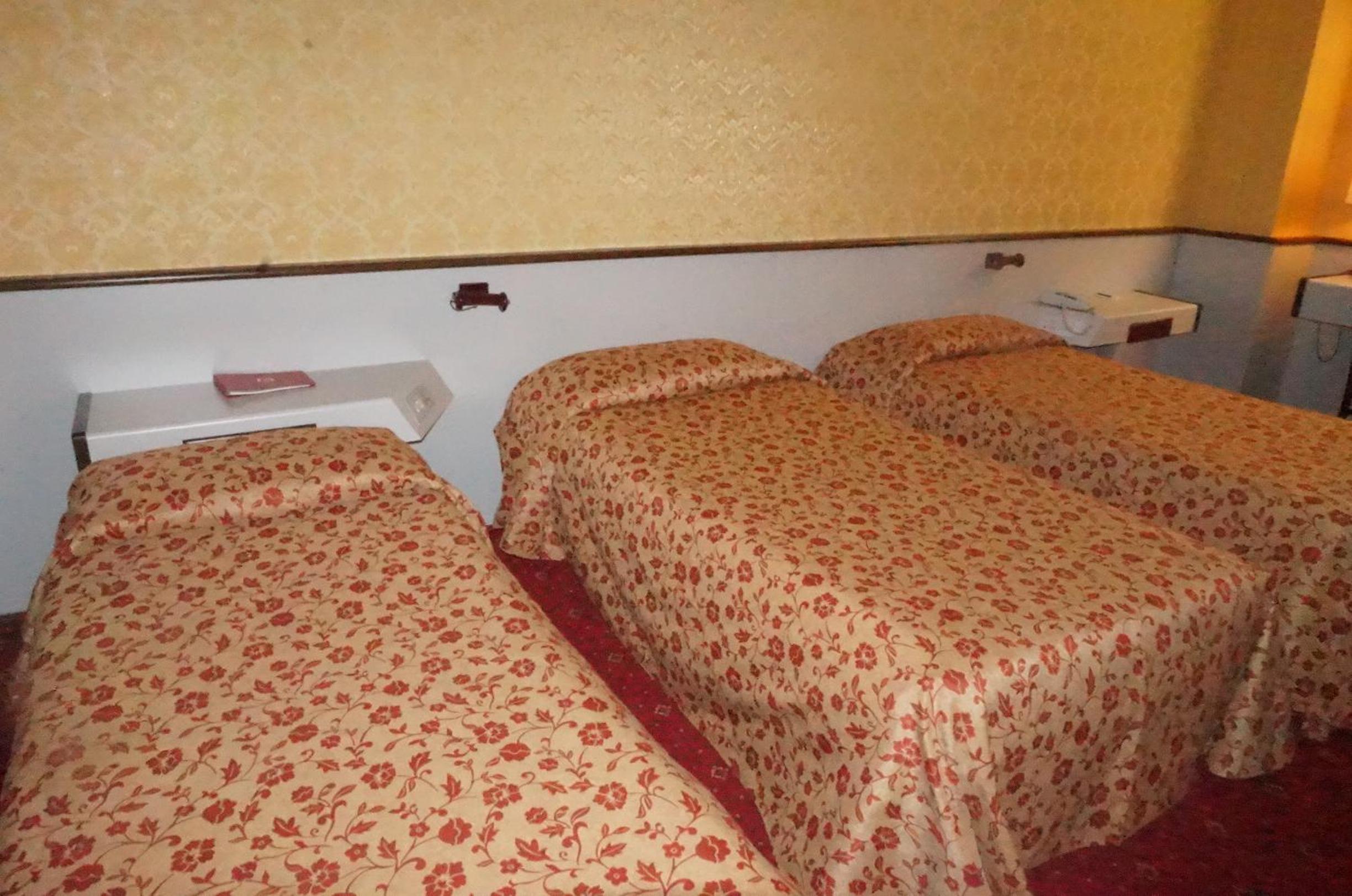 Cozy triple room for a restful night's sleep.