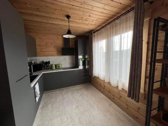 Four-Bedroom House - Photo 48