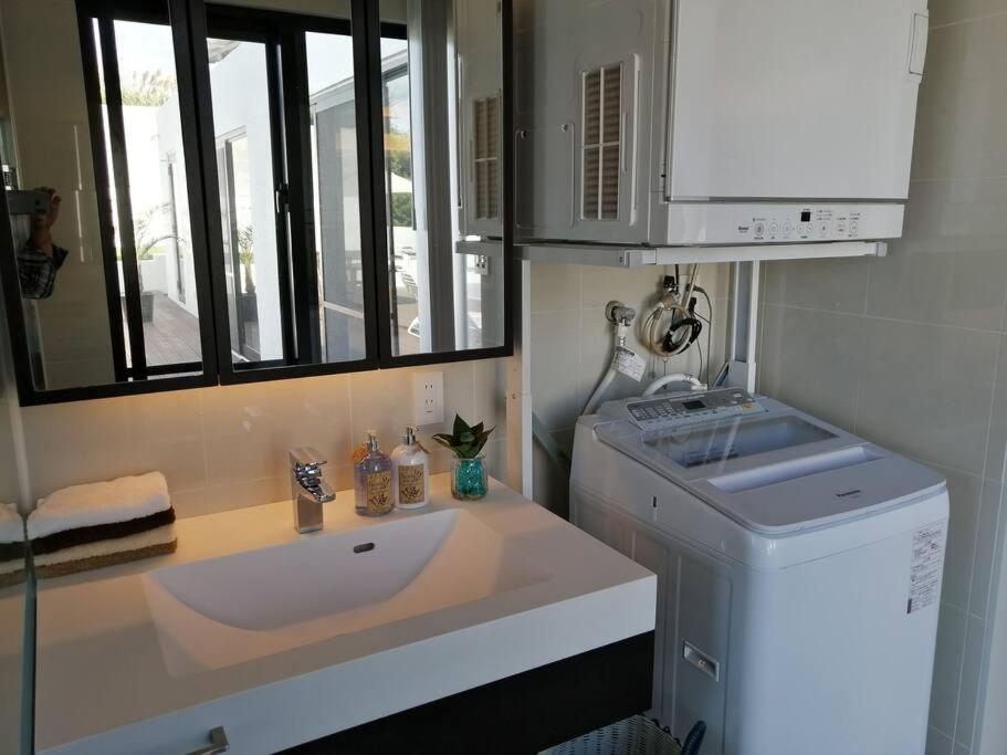 Three-Bedroom House - Photo 39