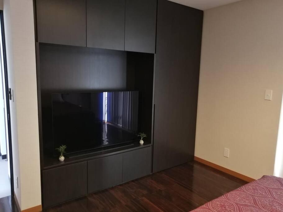 Three-Bedroom House - Photo 29