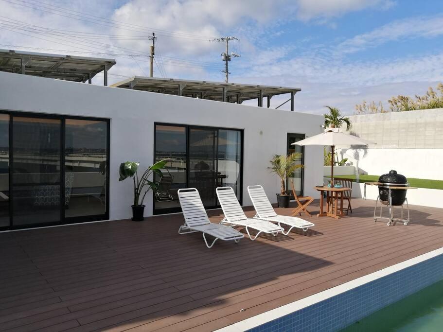 Three-Bedroom House - Photo 28