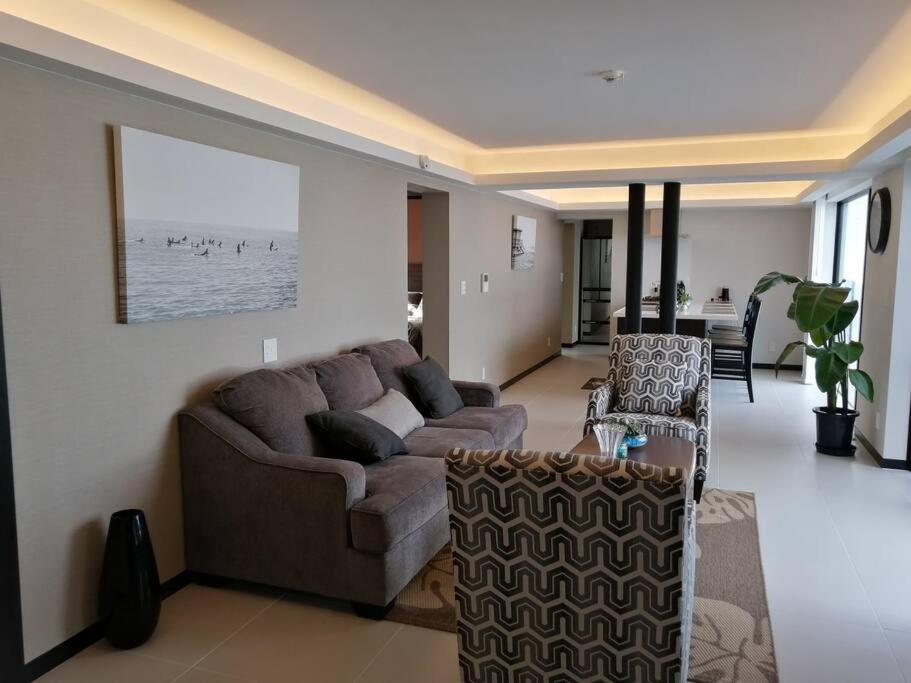Three-Bedroom House - Photo 27