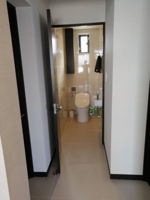 Three-Bedroom House - Photo 23