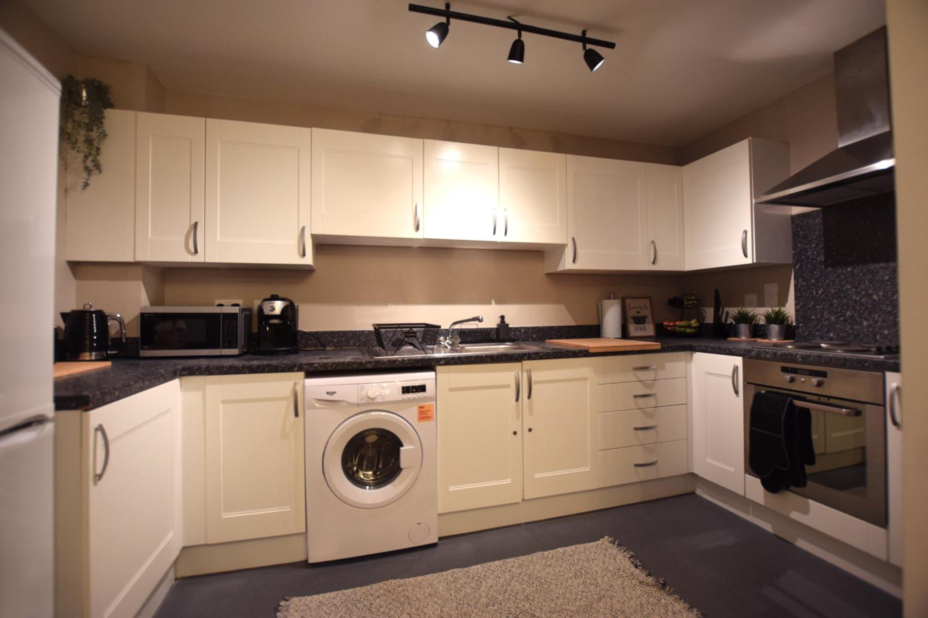 Two-Bedroom Apartment - Photo 19