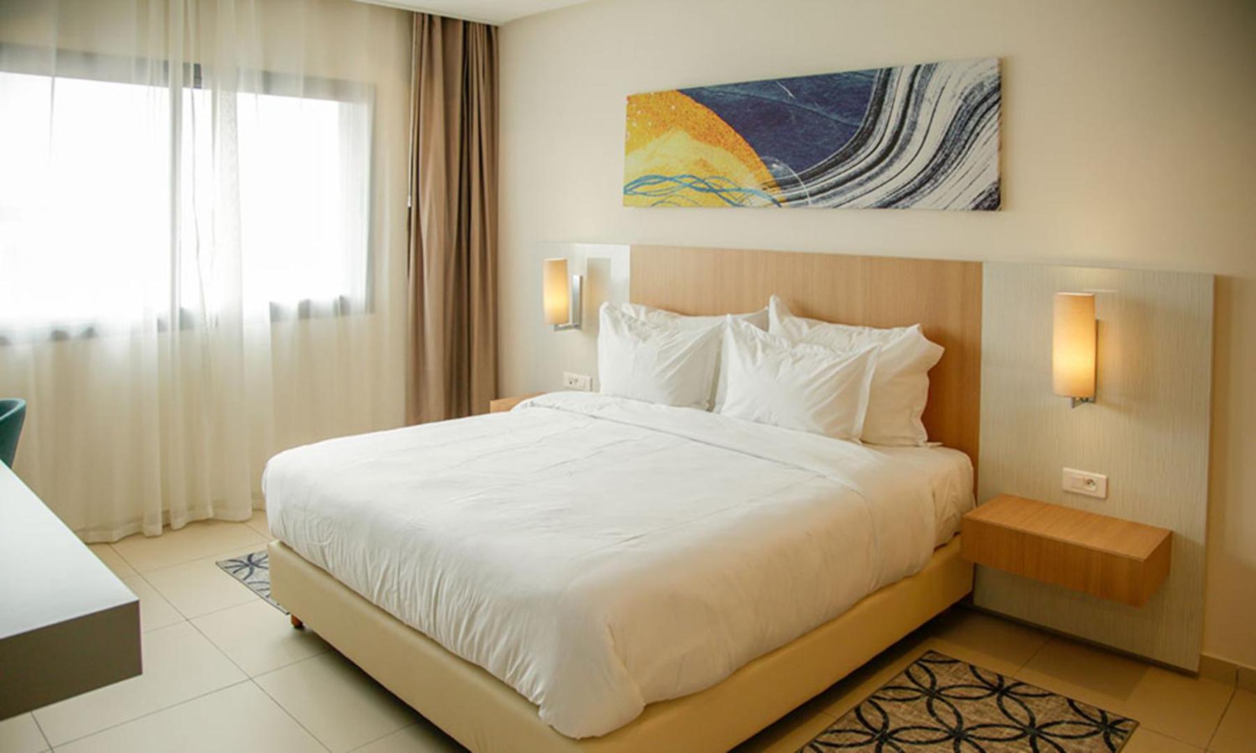 Three-Bedroom Apartment - Photo 1