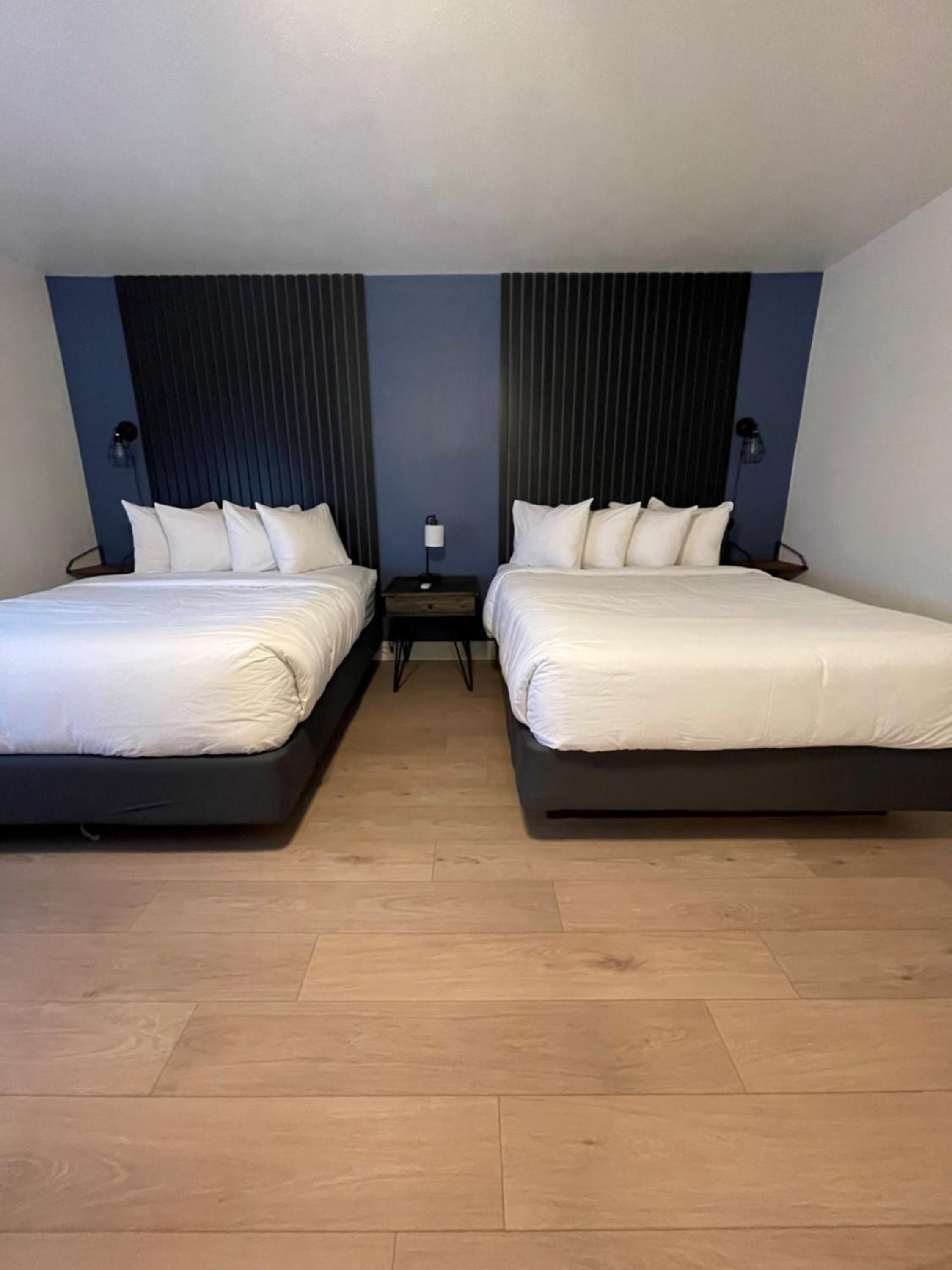 Queen Room with Two Queen Beds - Photo 10