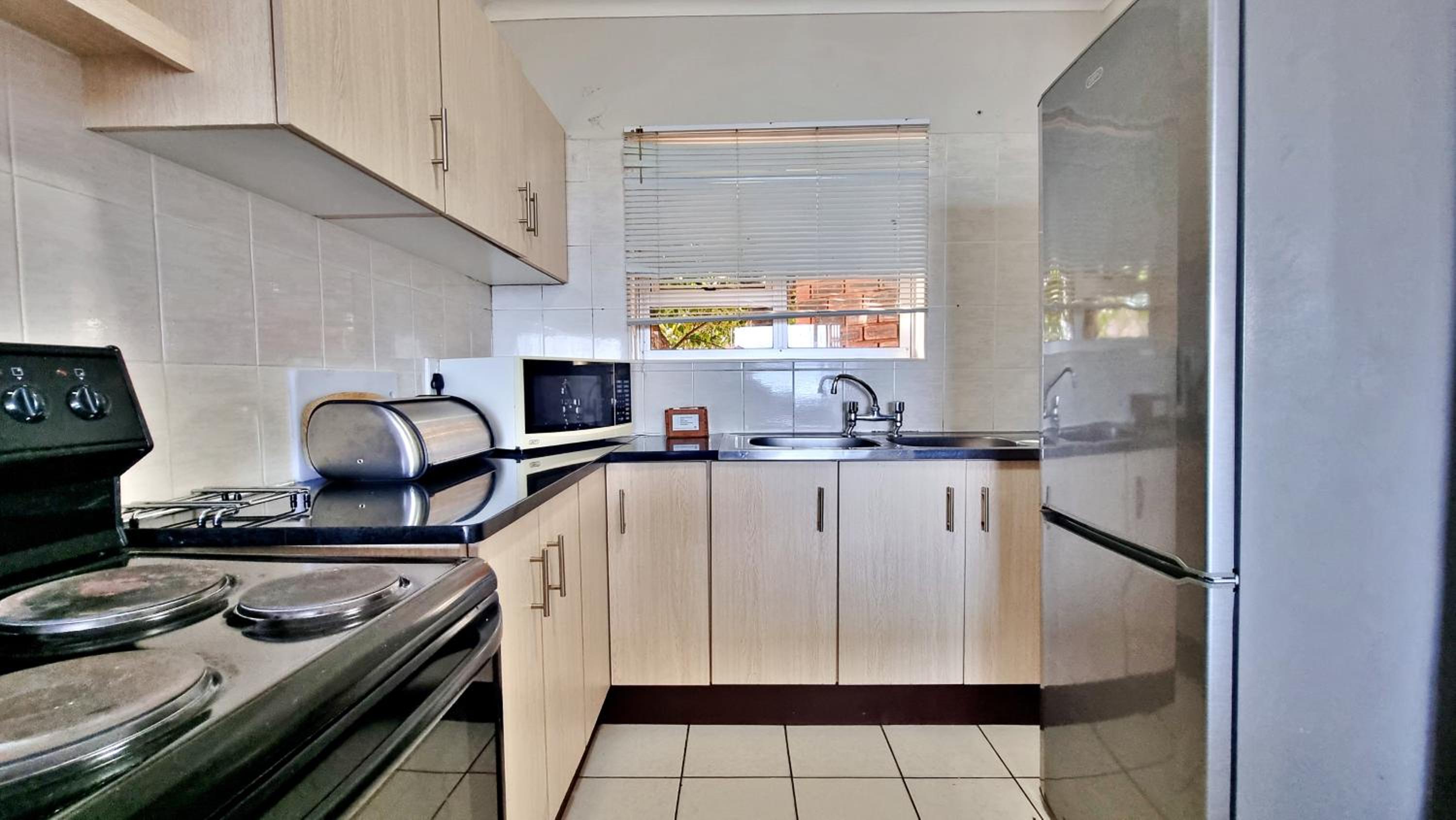Three-Bedroom Apartment - Photo 3