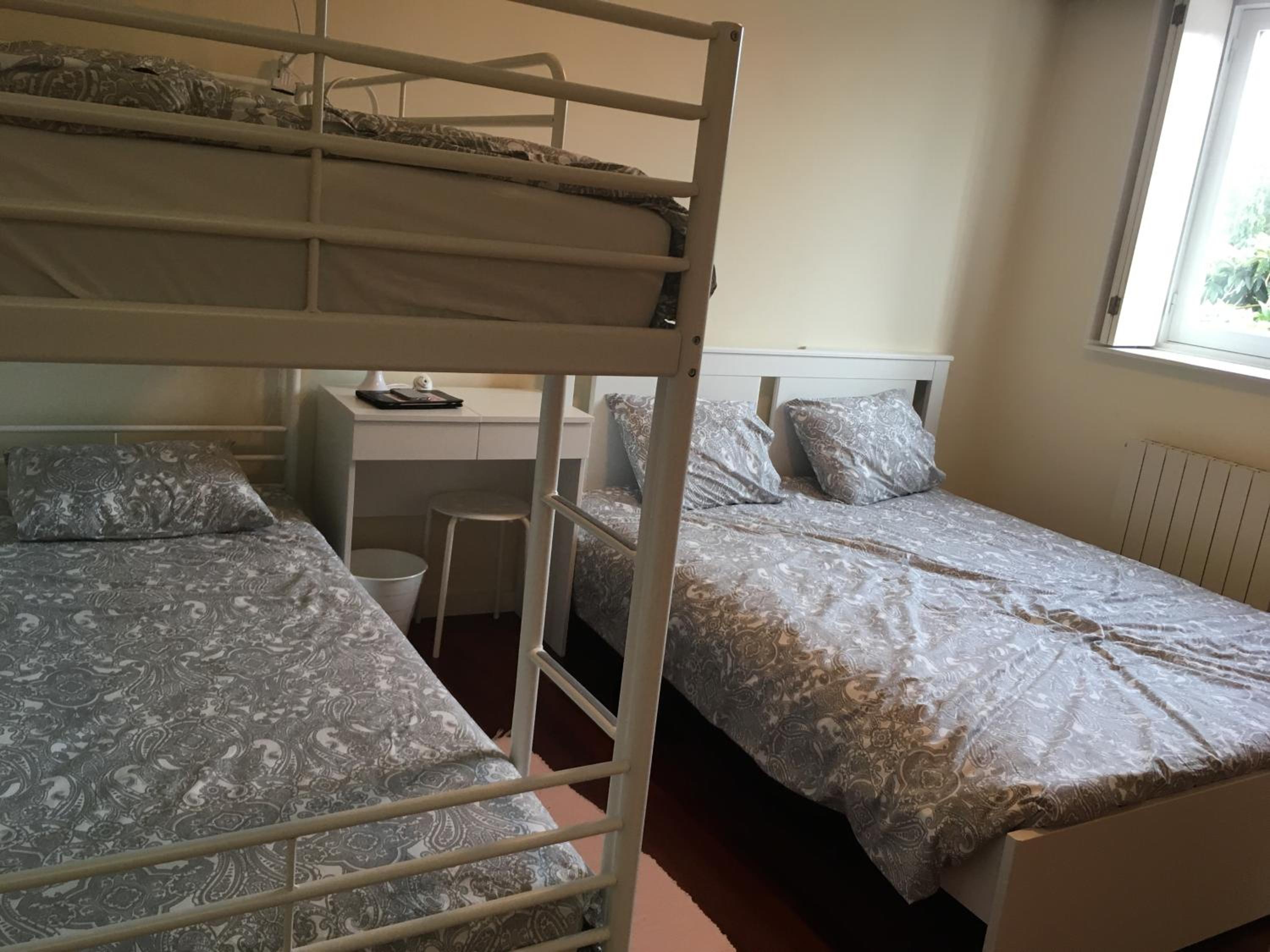 Three-Bedroom House - Photo 35