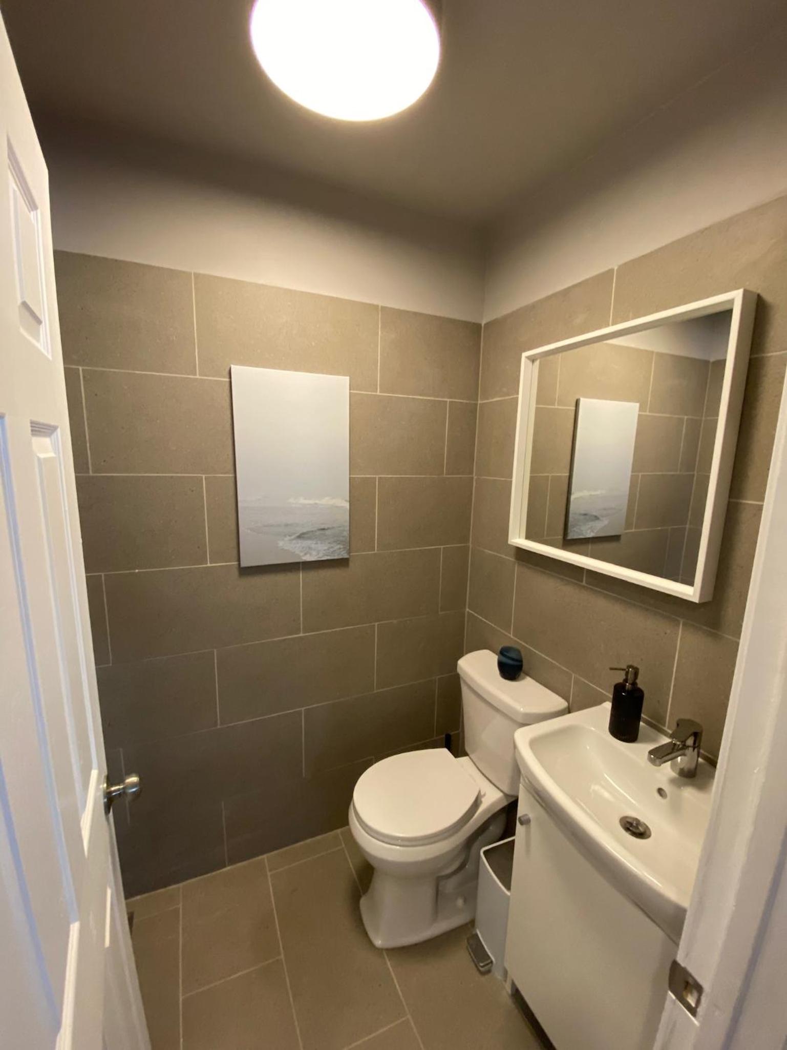 Three-Bedroom House - Photo 25