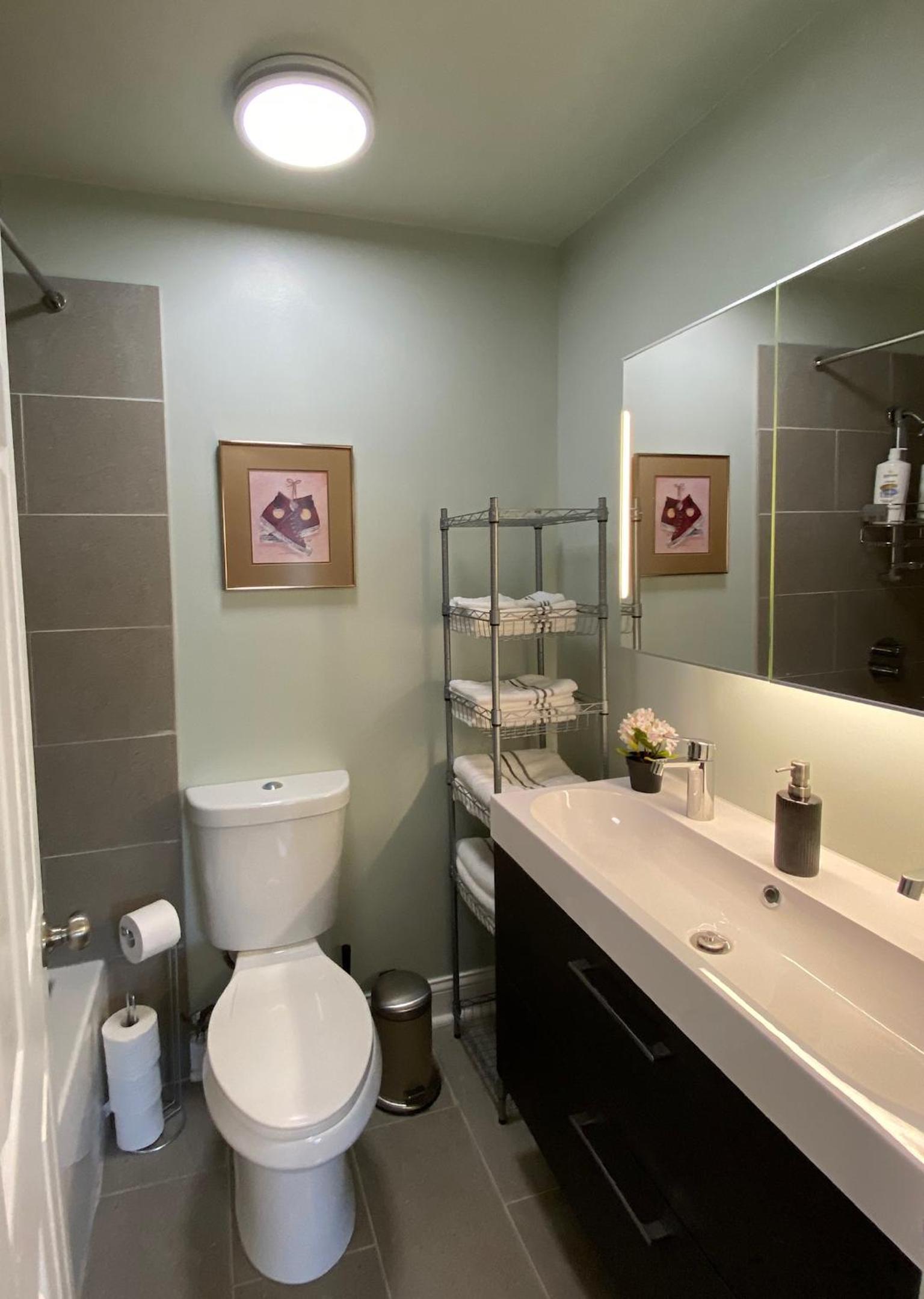 Three-Bedroom House - Photo 29