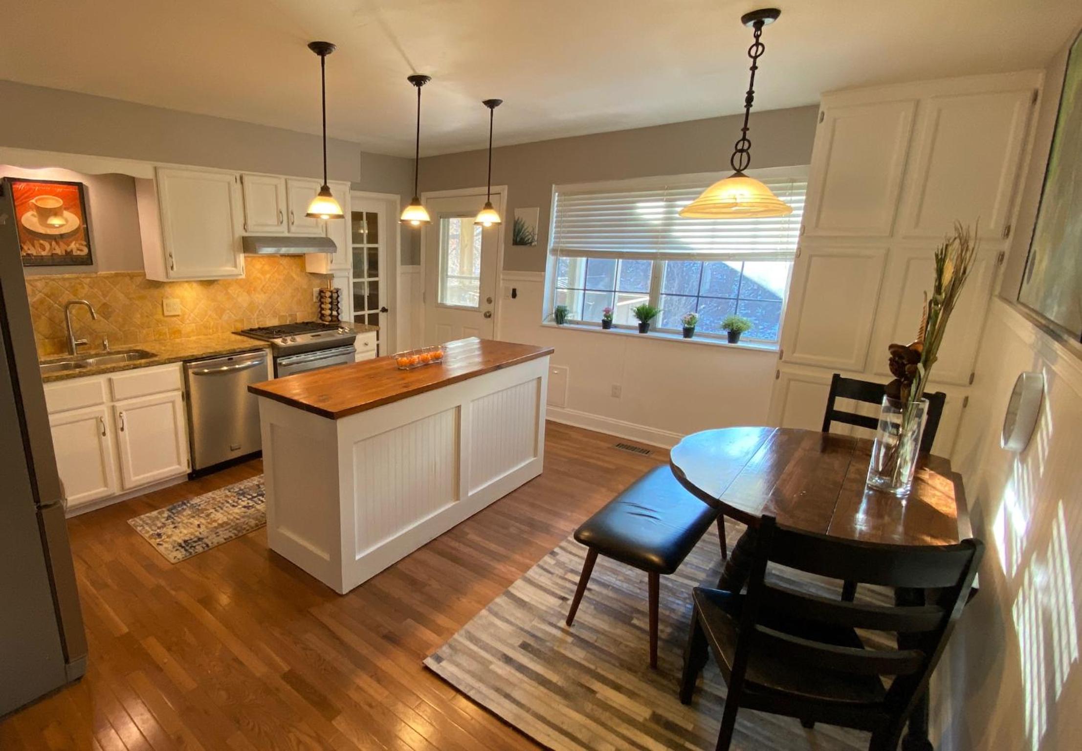 Three-Bedroom House - Photo 36