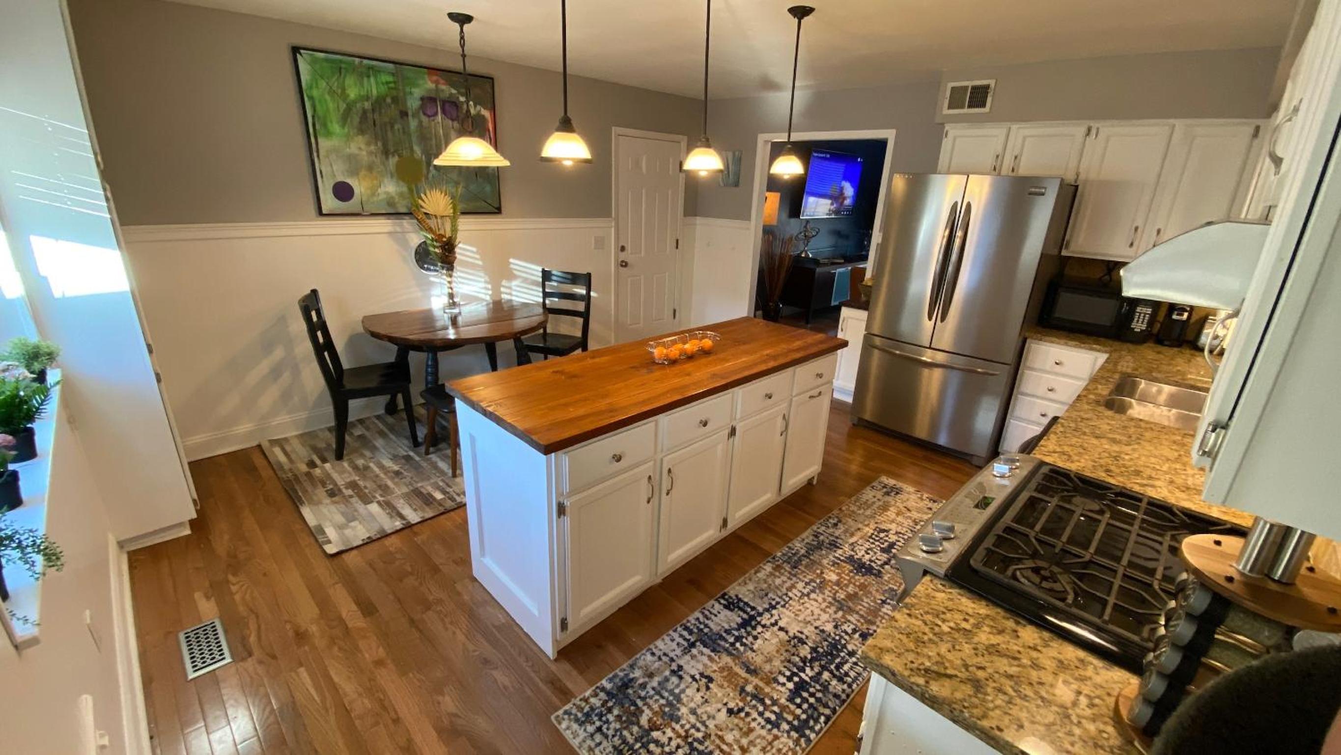 Three-Bedroom House - Photo 19