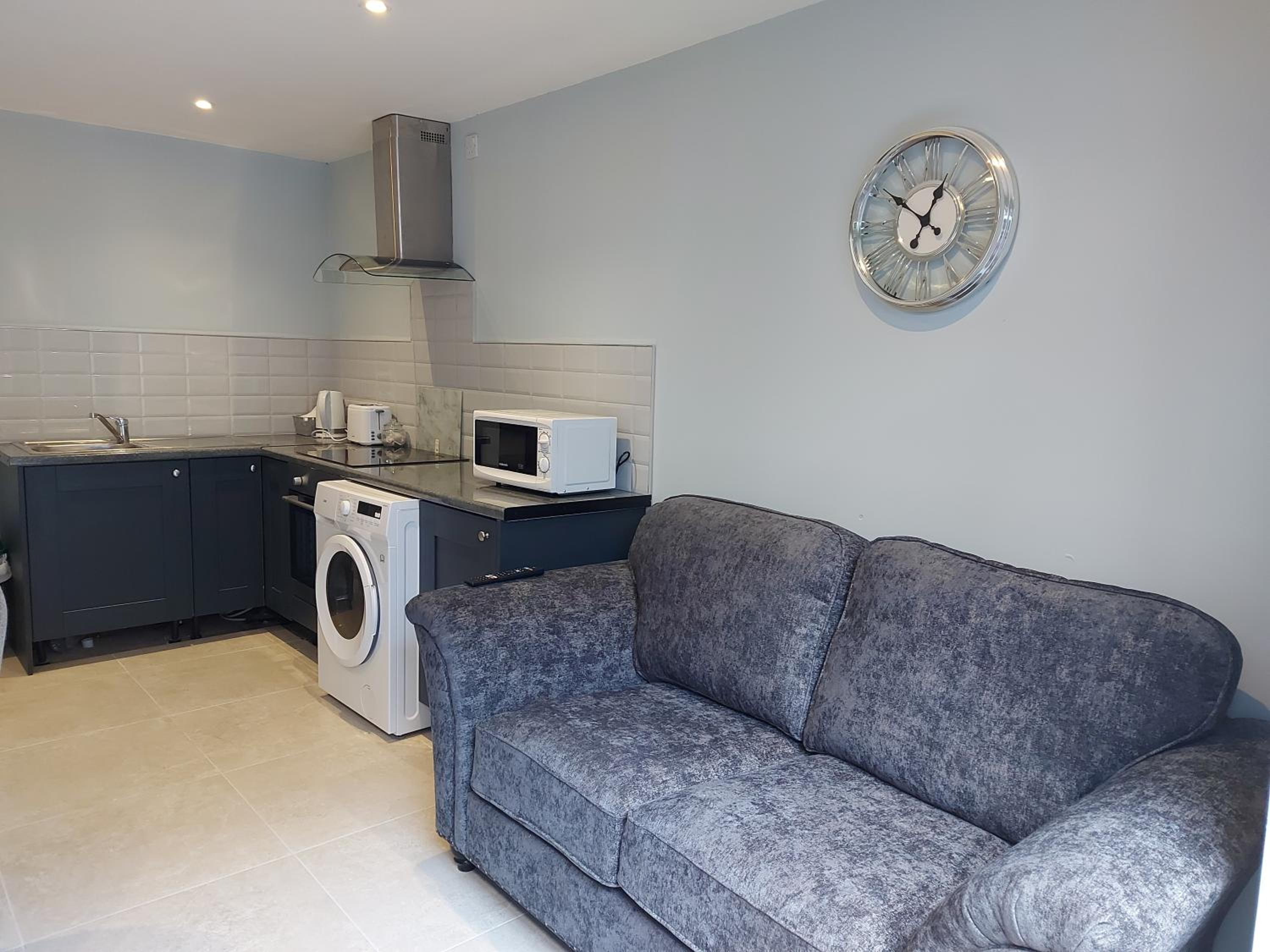 Three-Bedroom Apartment - Photo 12