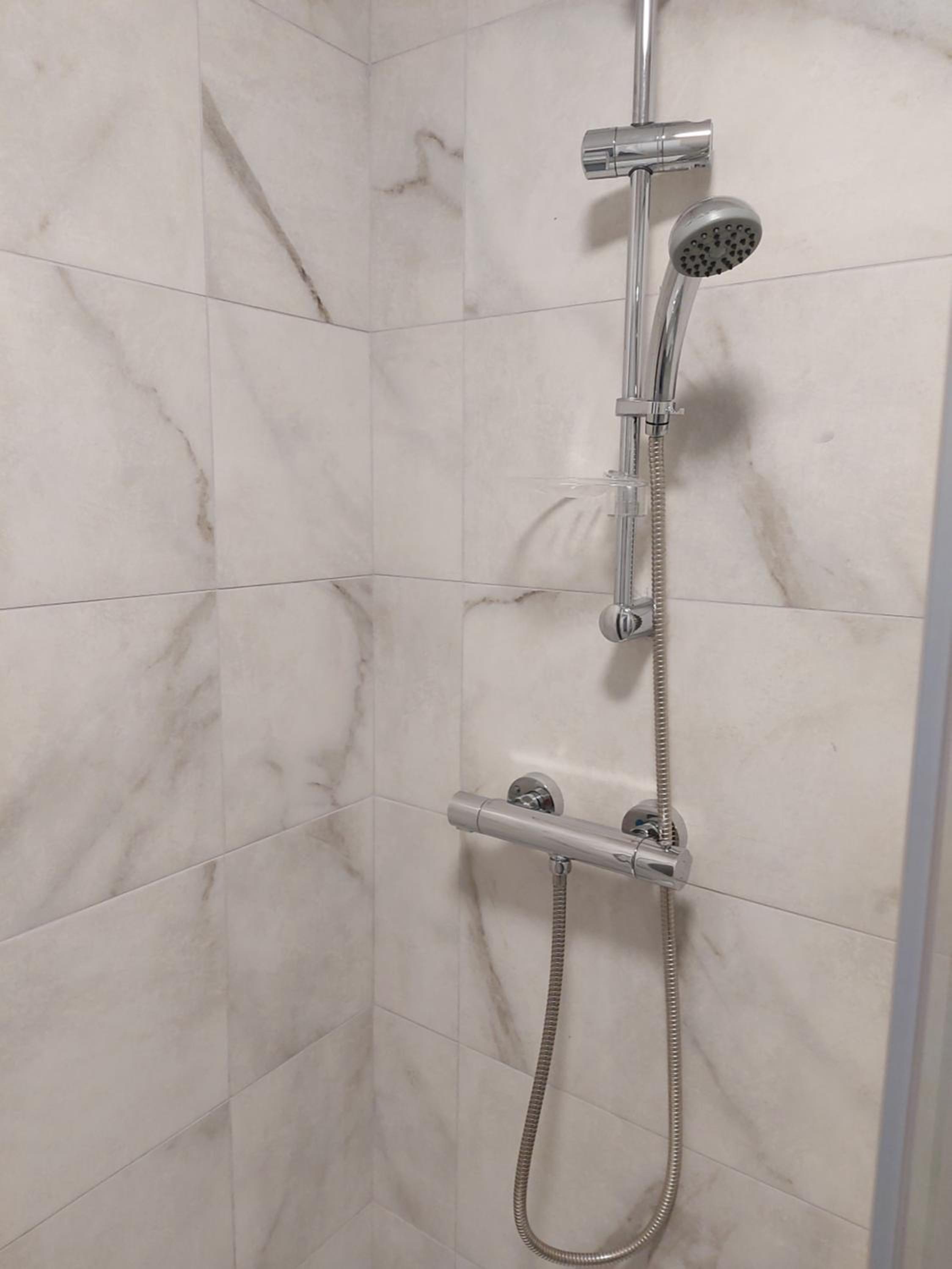 Three-Bedroom Apartment - Photo 6