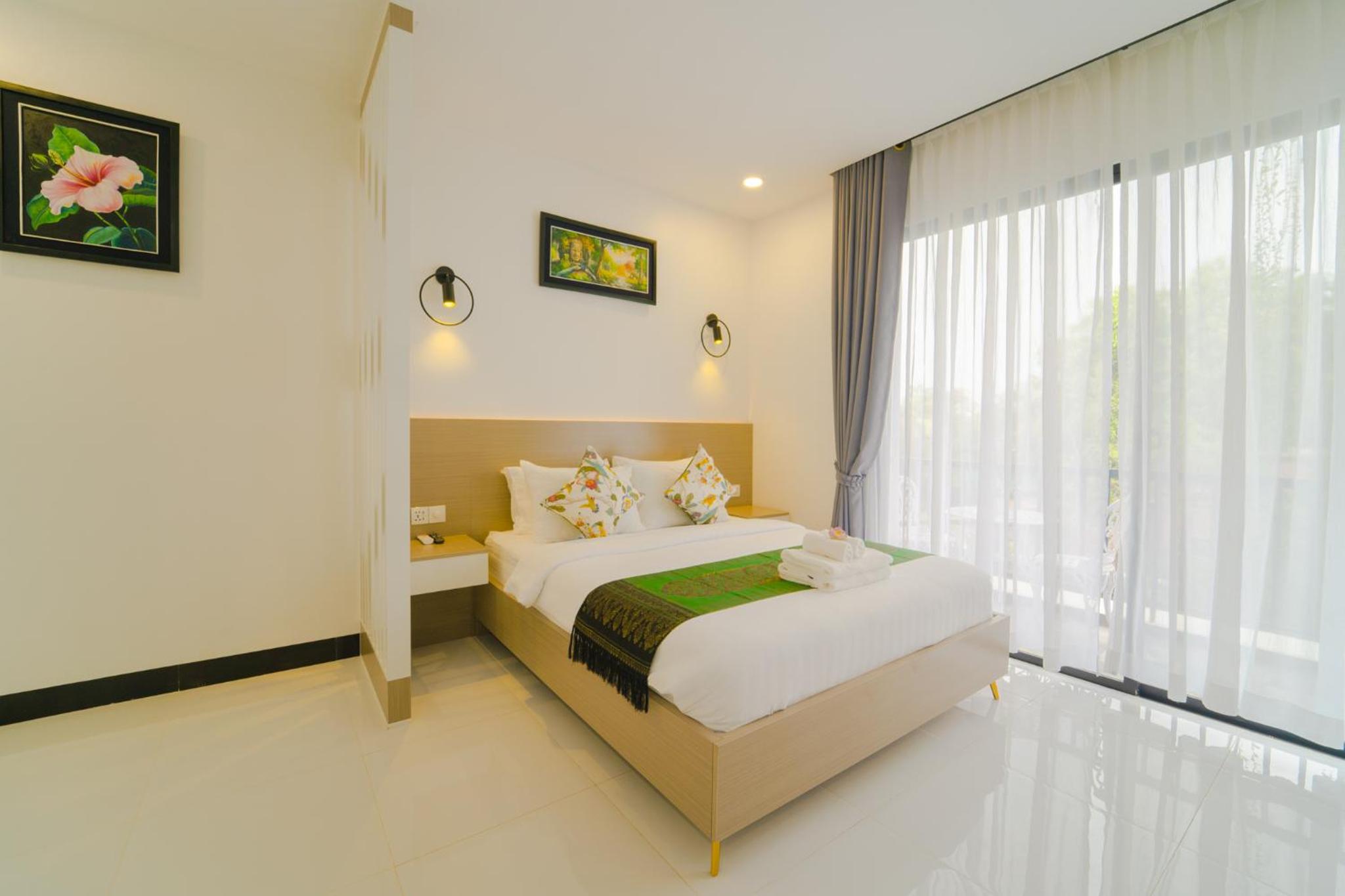 Deluxe Double Room - Photo 9