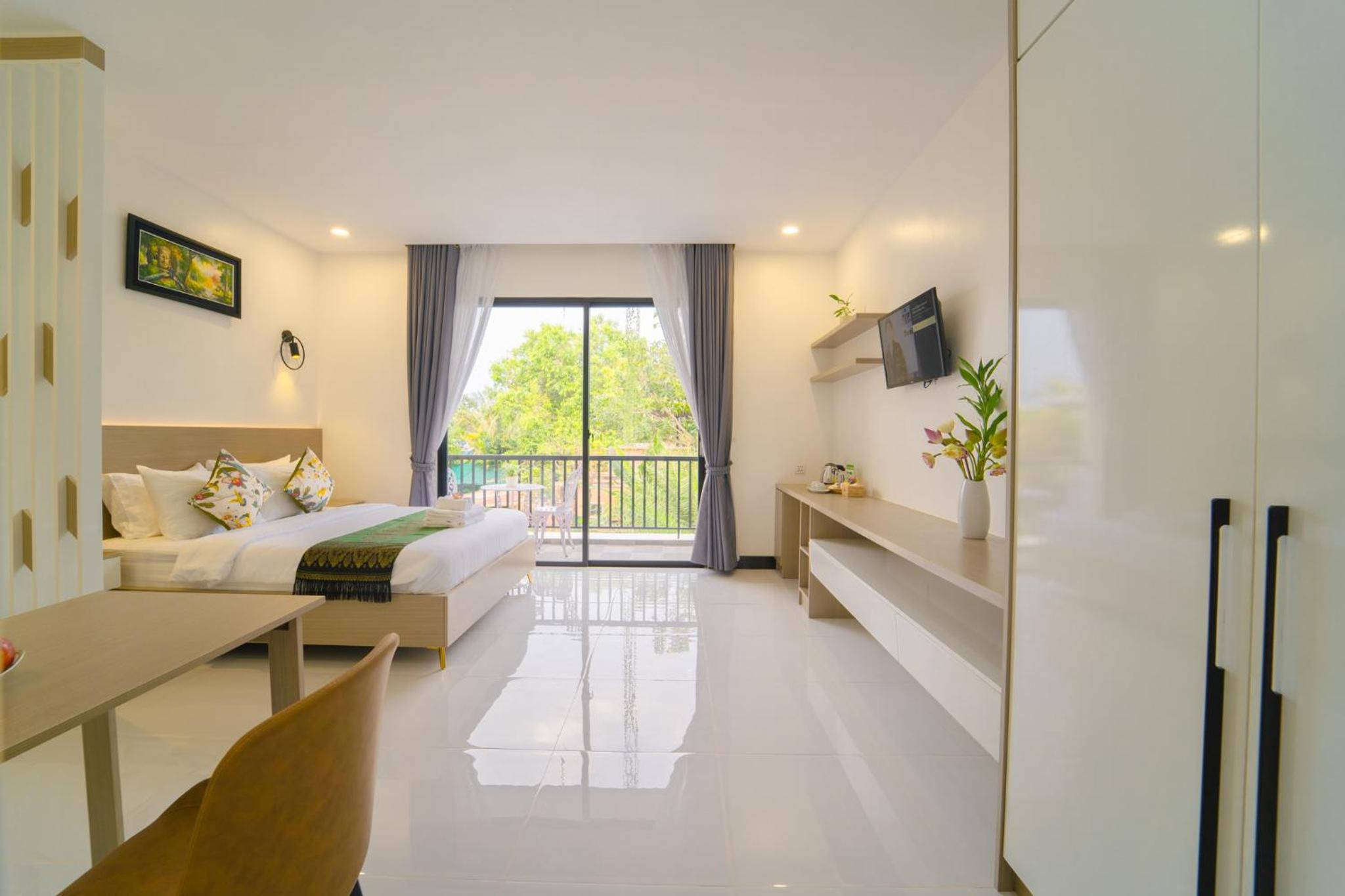 Deluxe Double Room - Photo 11