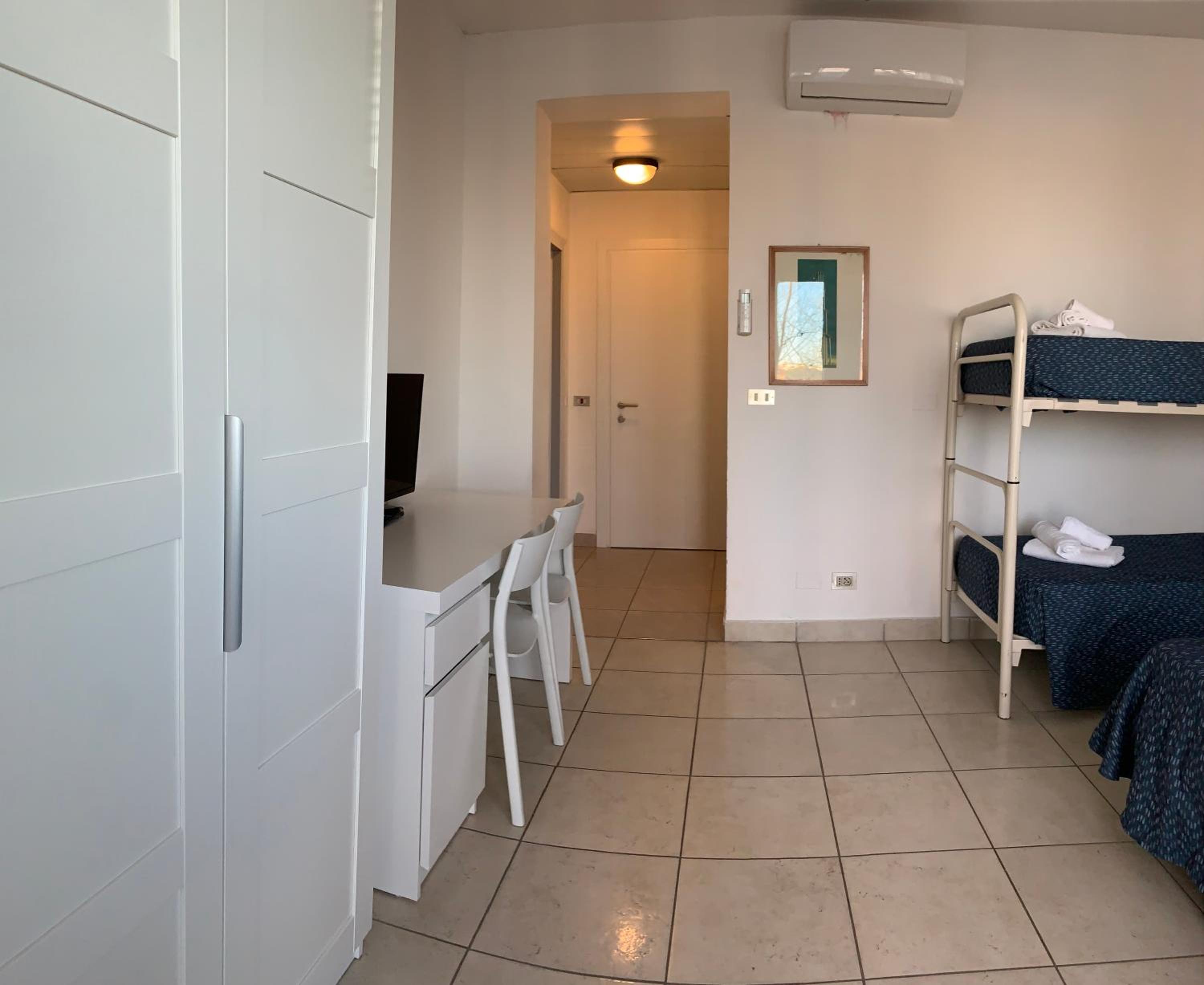 Quadruple Room with Balcony - Photo 21