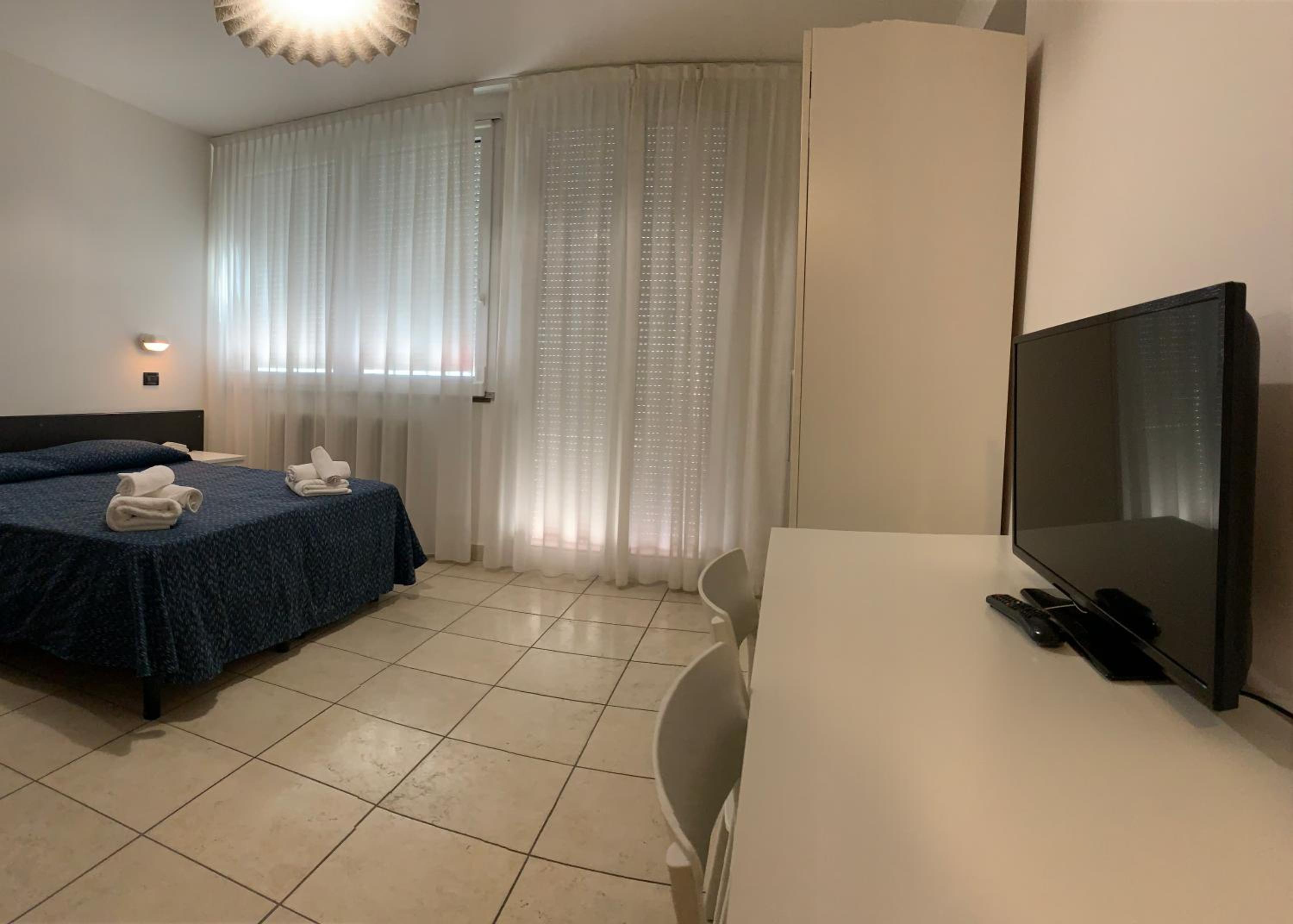Quadruple Room with Balcony - Photo 23