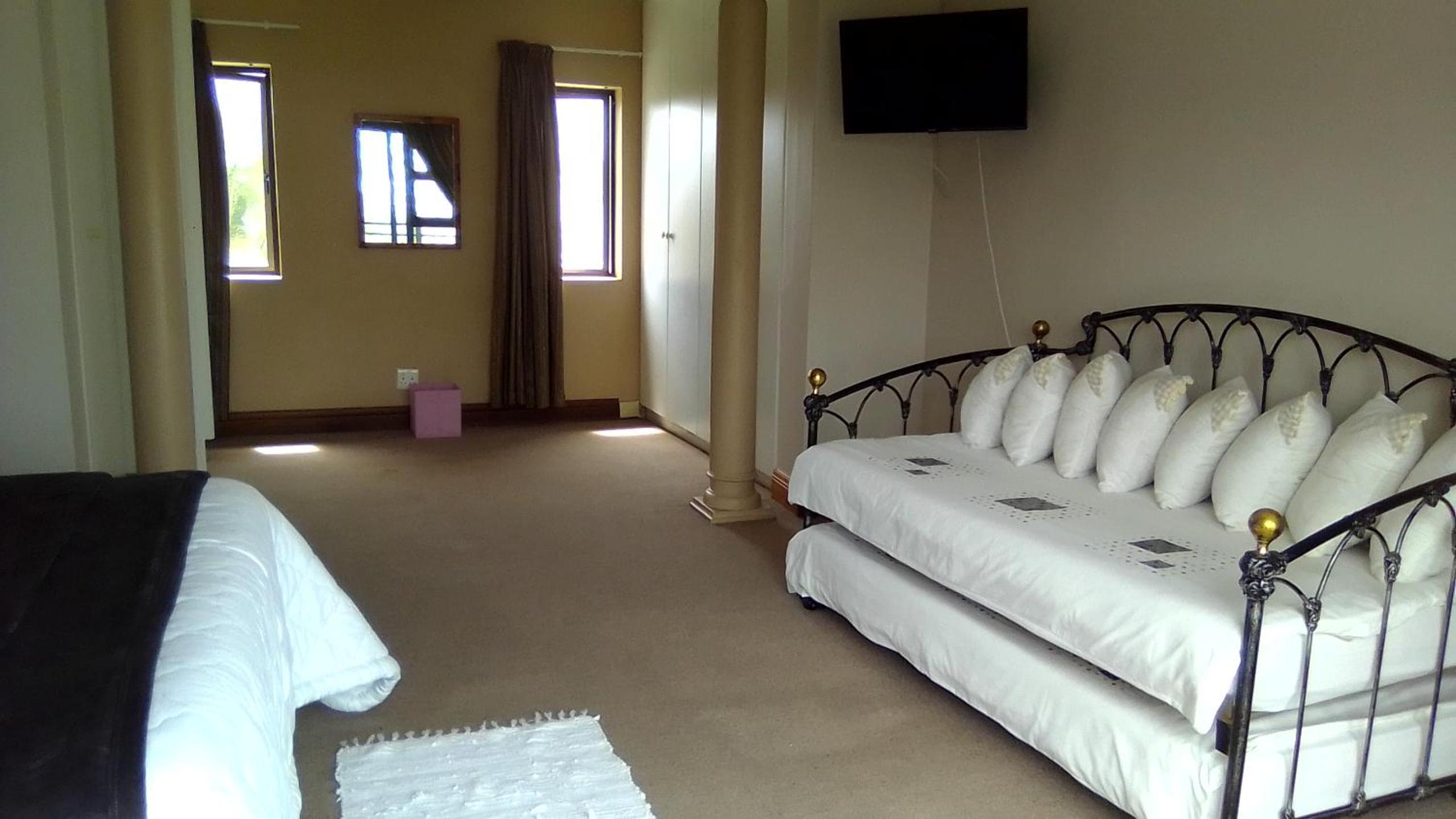 Family Room with Balcony - Photo 3