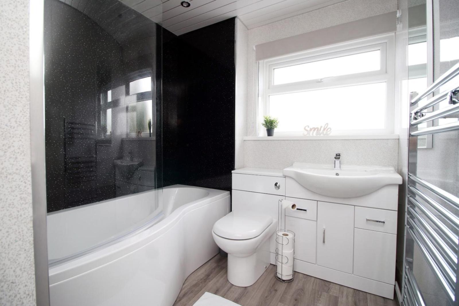 Four-Bedroom House - Photo 13