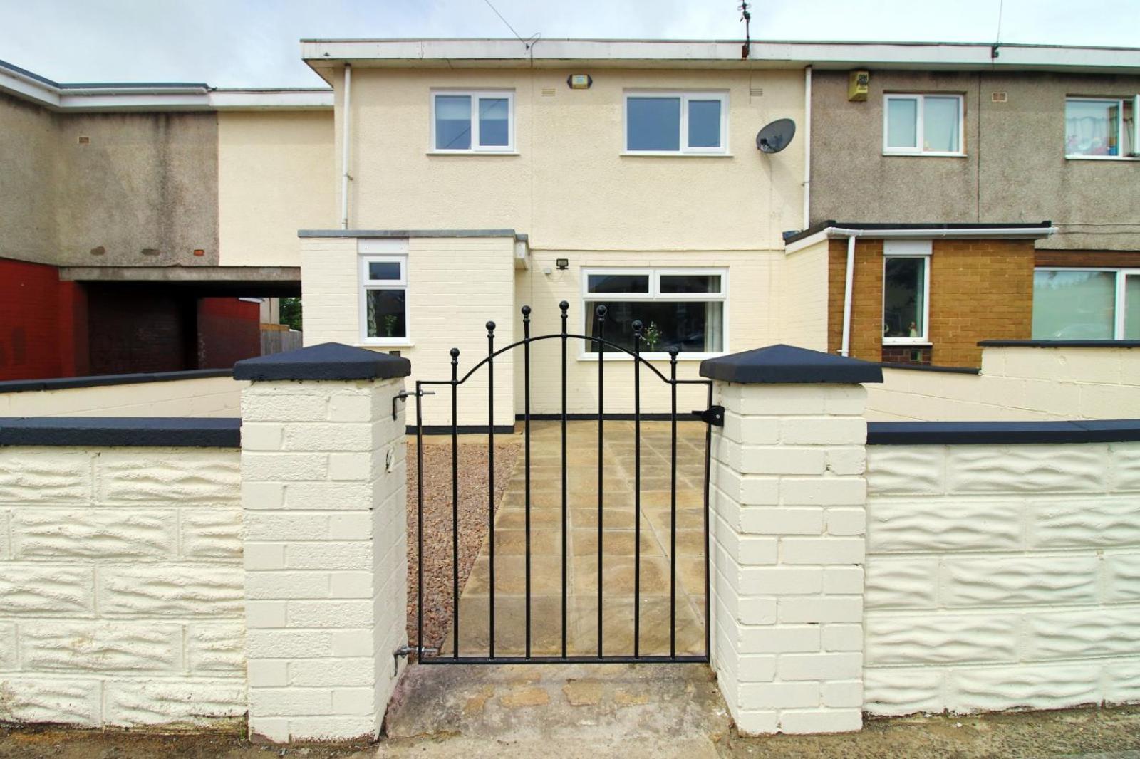 Four-Bedroom House - Photo 26