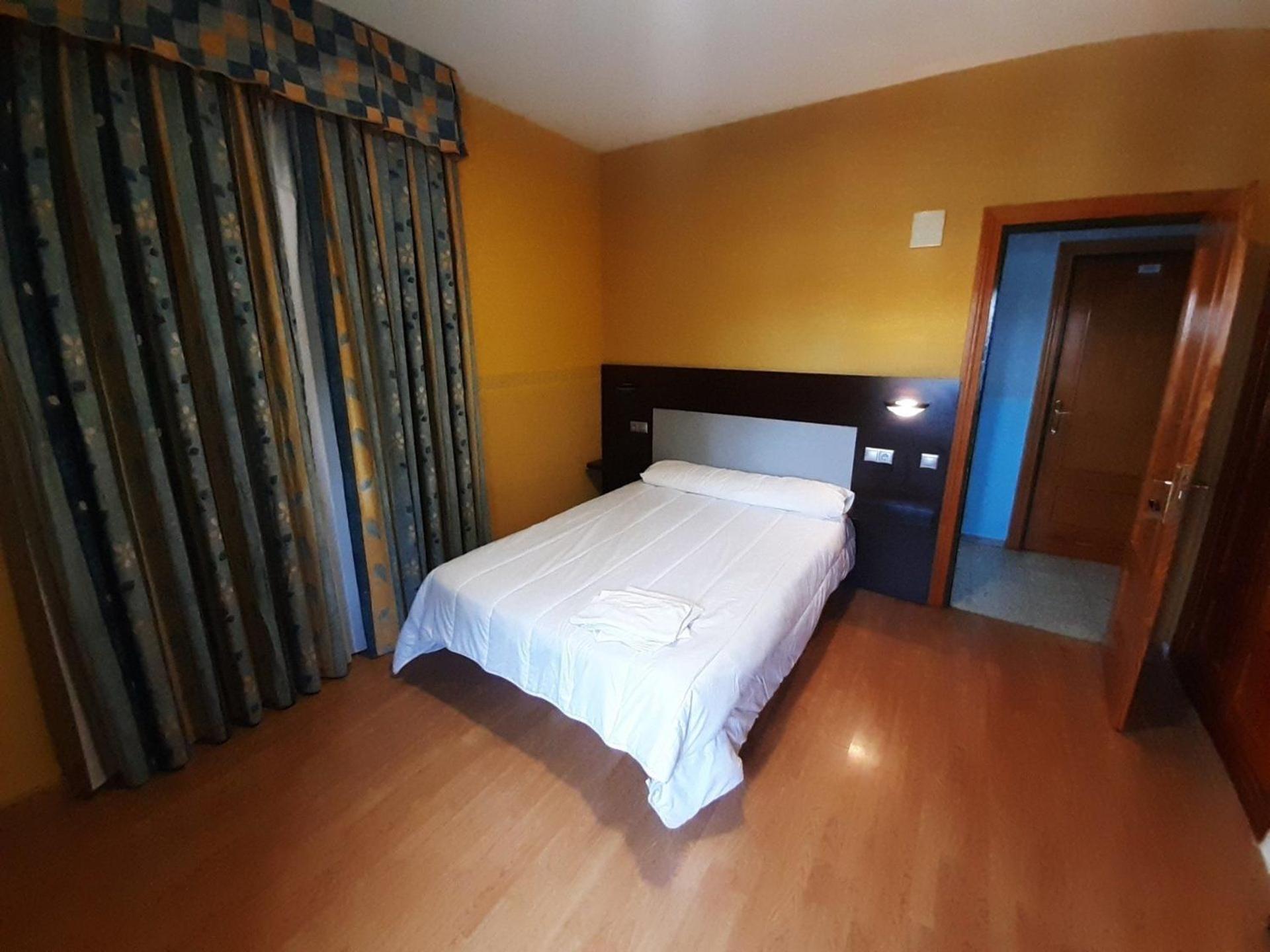 Habitación Estándar con Cama Queen