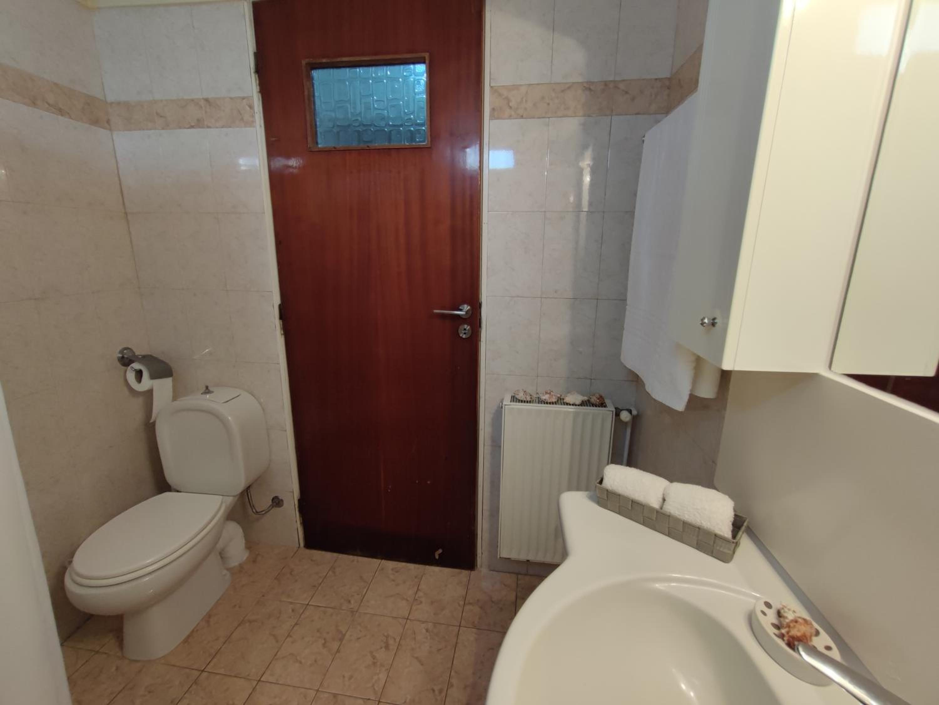 Three-Bedroom House - Photo 7