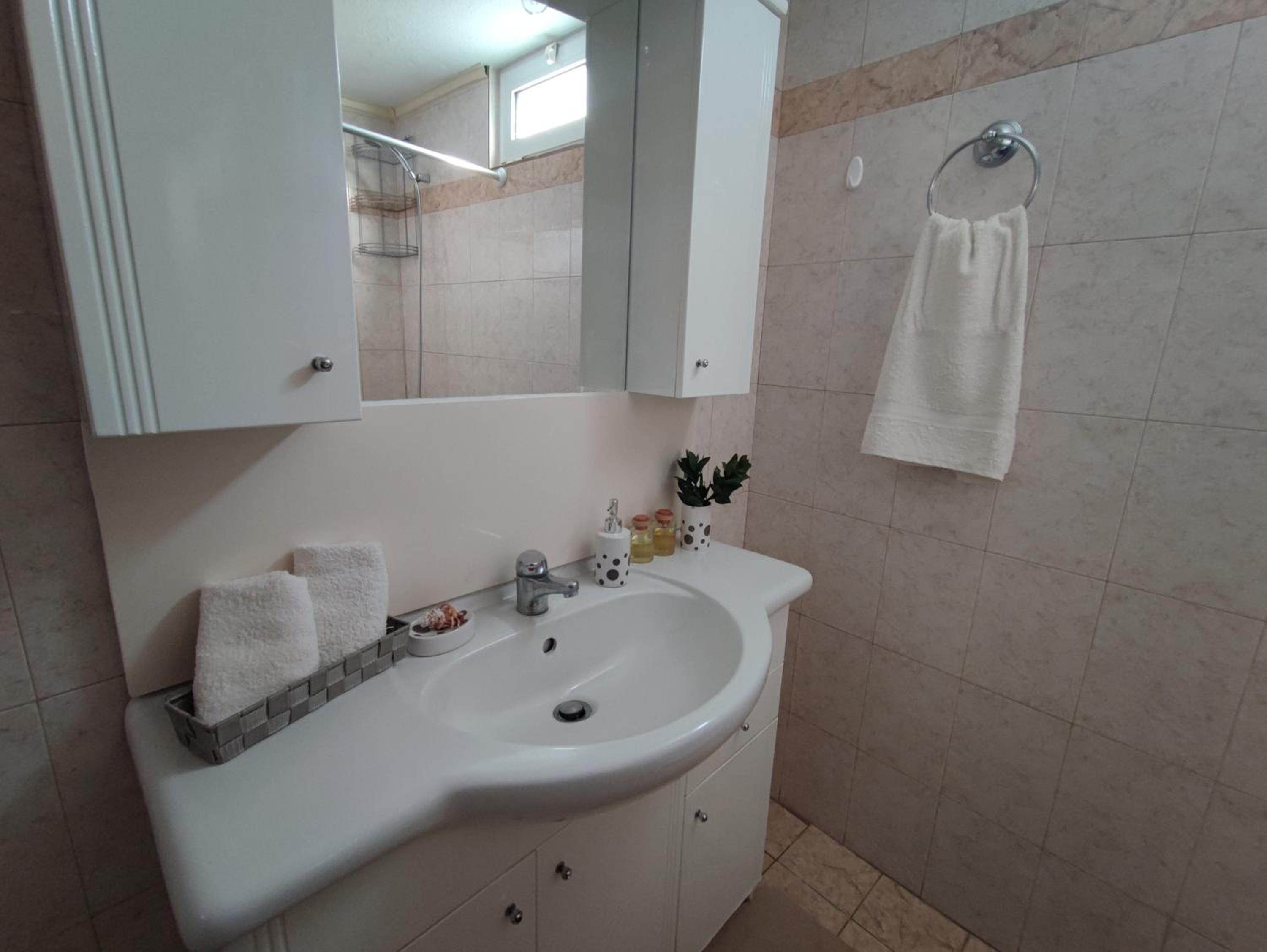 Three-Bedroom House - Photo 15