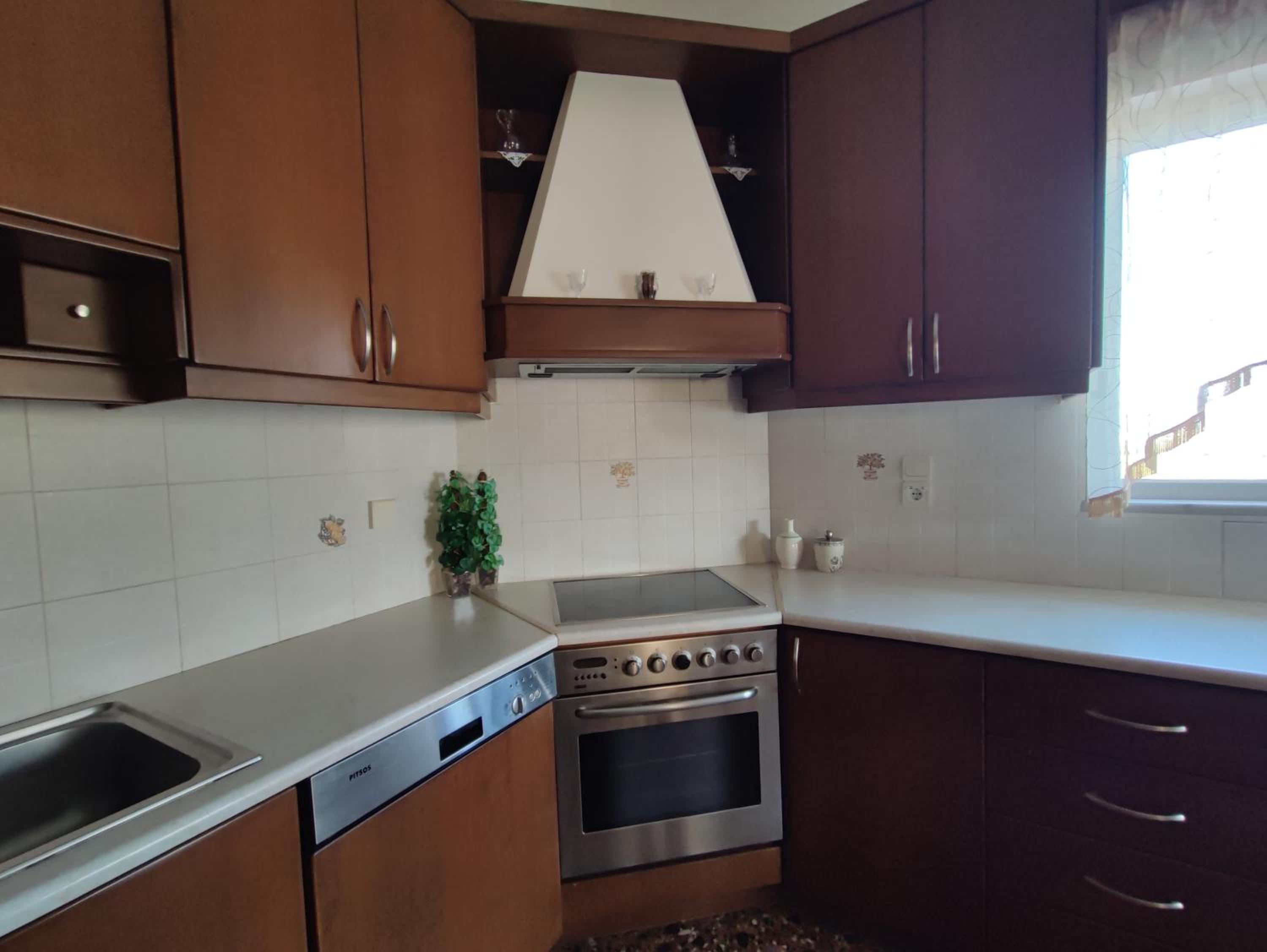 Three-Bedroom House - Photo 18