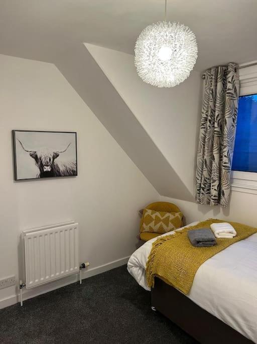 Three-Bedroom Apartment - Photo 4