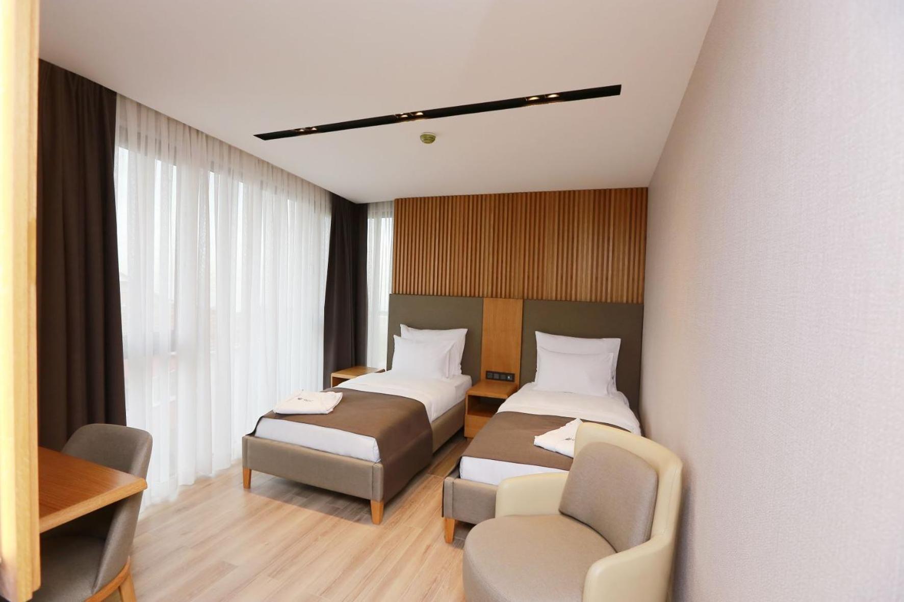 Standard Twin Room - Photo 1