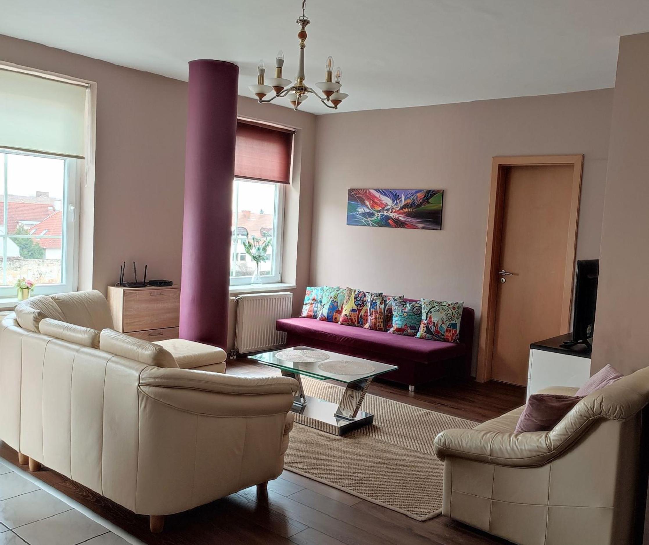 Three-Bedroom Apartment with Balcony - Photo 1