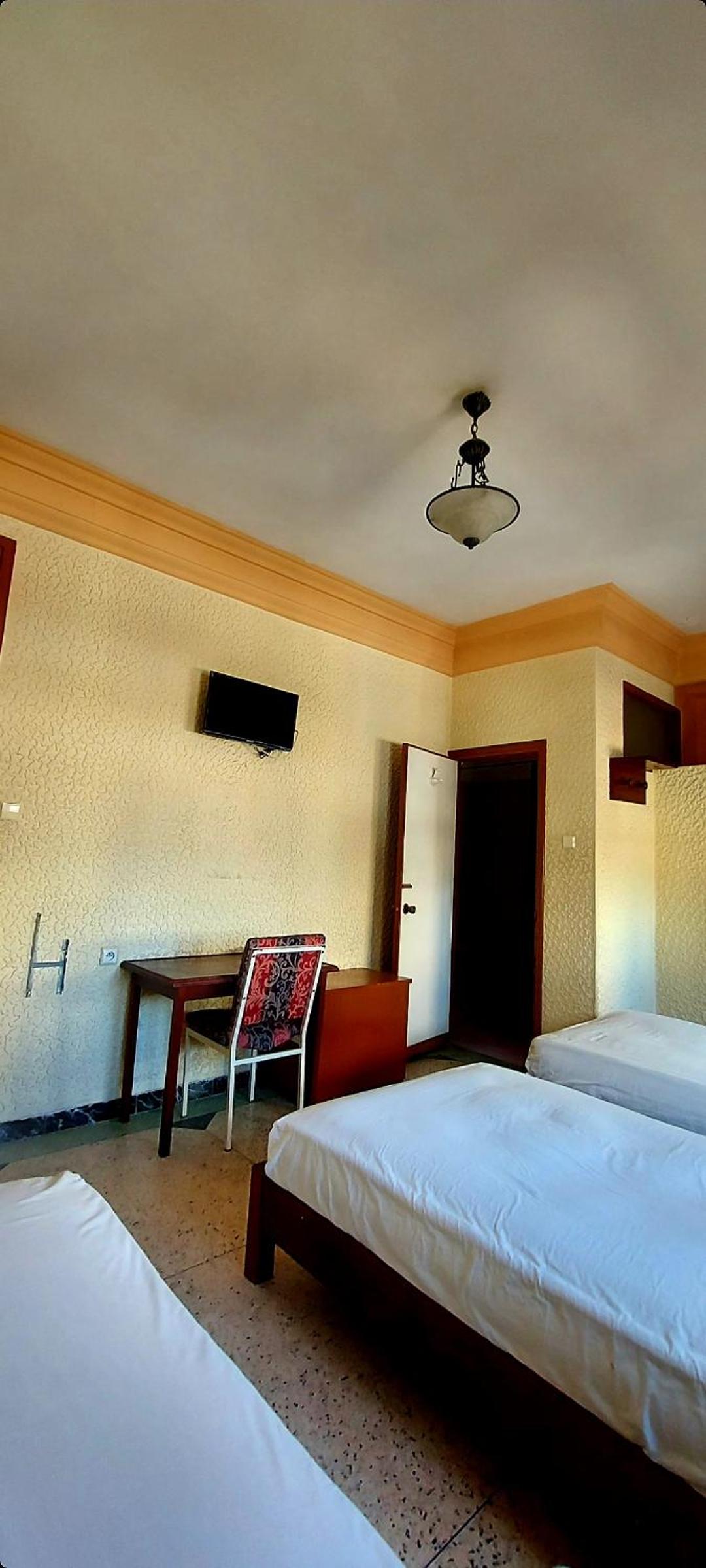 Standard Triple Room - Photo 7