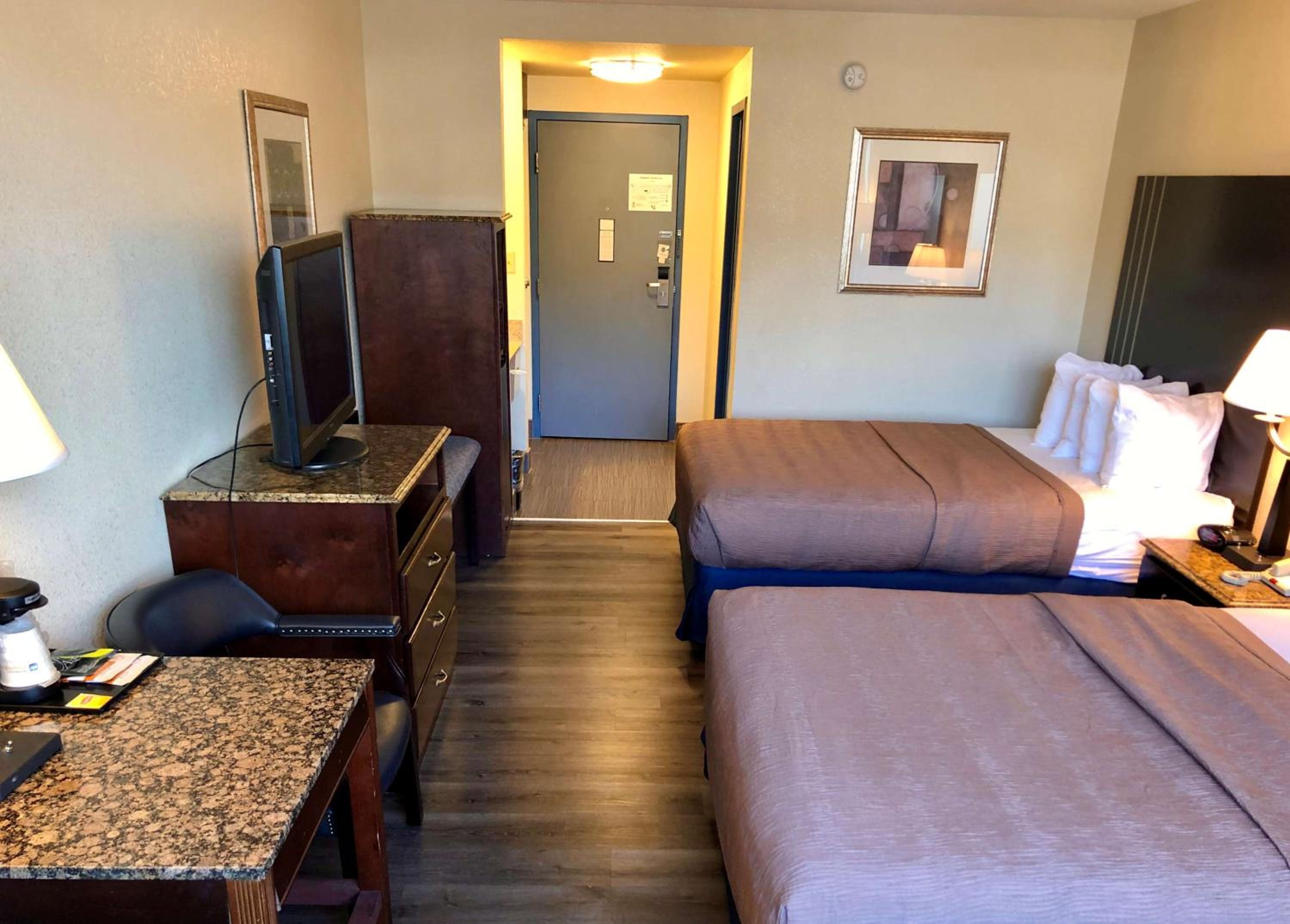 Queen Room with Two Queen Beds - Pet Friendly/Non-Smoking - Photo 1