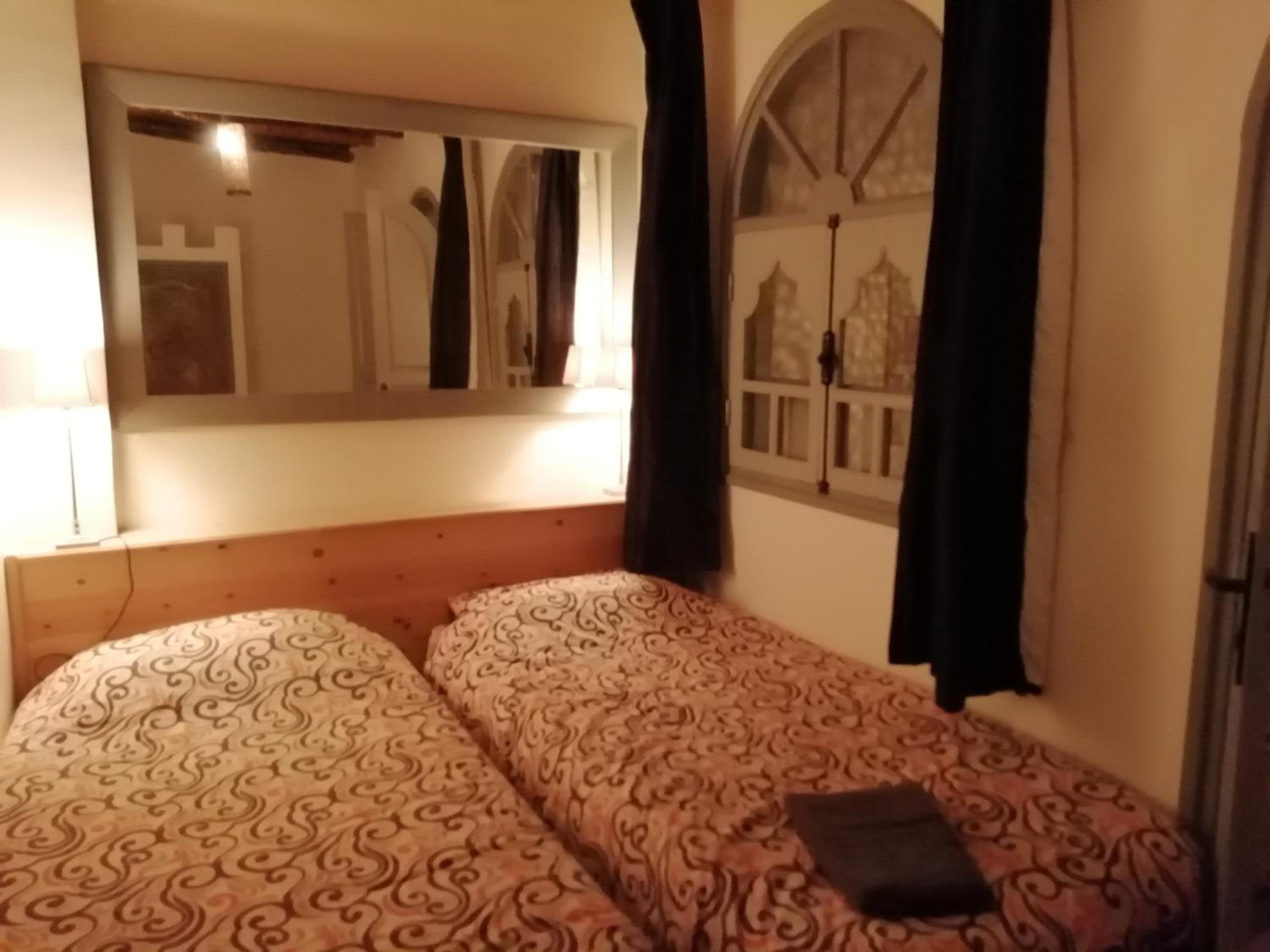 Three-Bedroom House - Photo 28