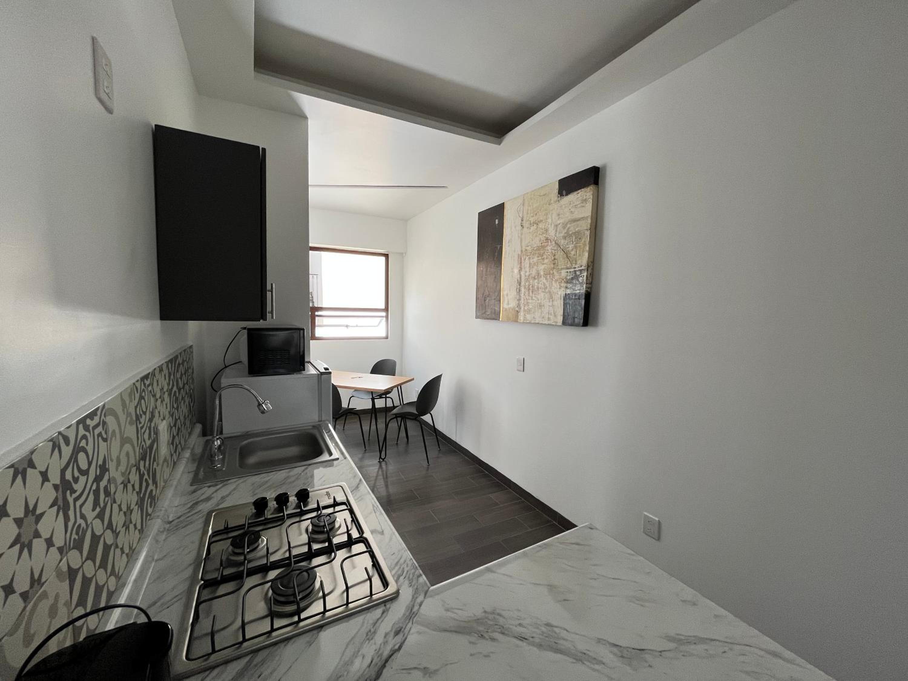 Apartment with Balcony - Photo 10