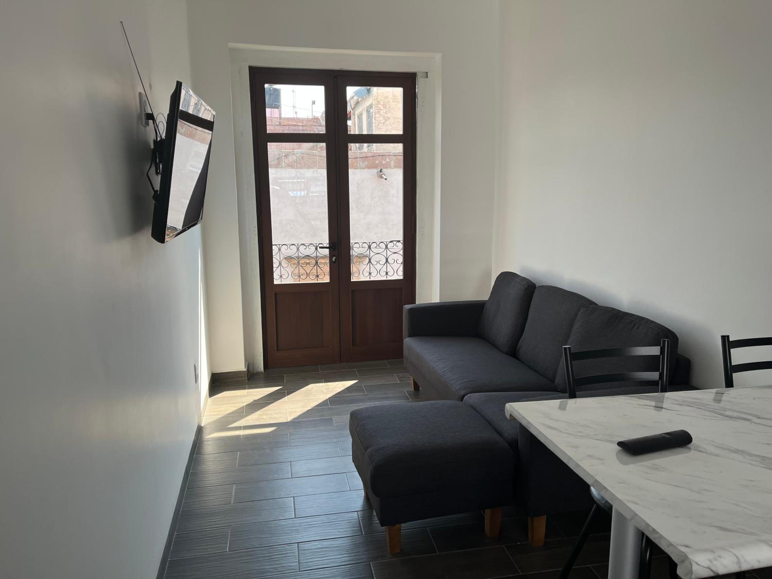 Apartment with Balcony - Photo 1