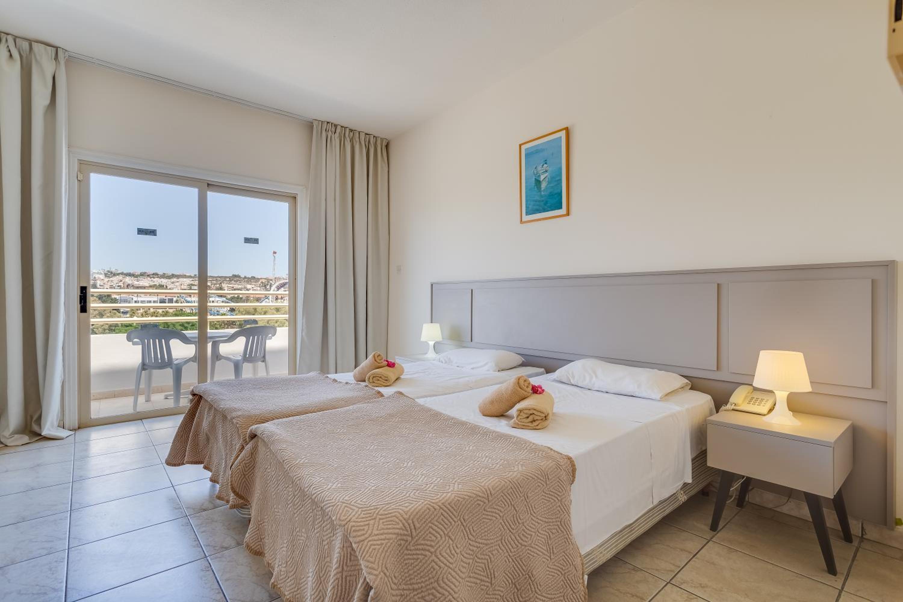 Double Room with Balcony (2 Adults + 1 Child)