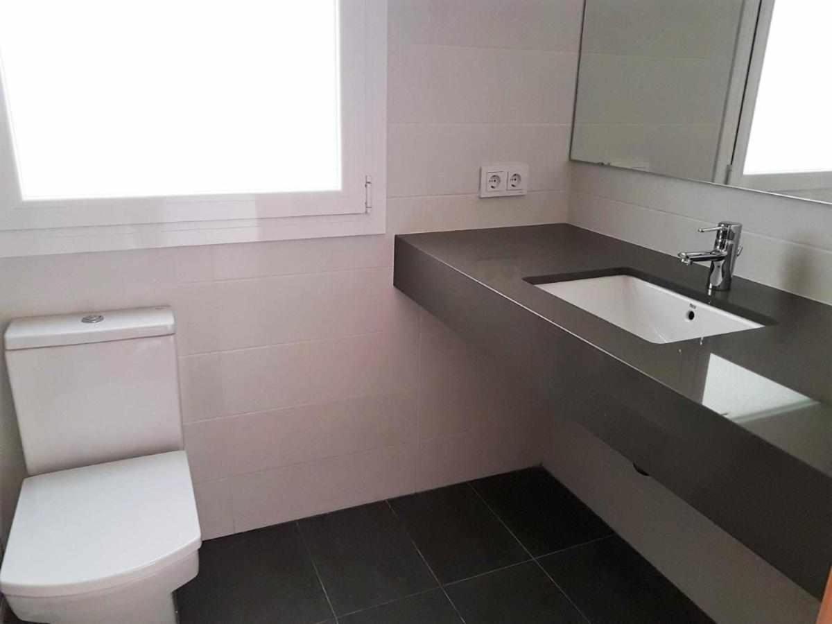 Three-Bedroom Apartment - Photo 12