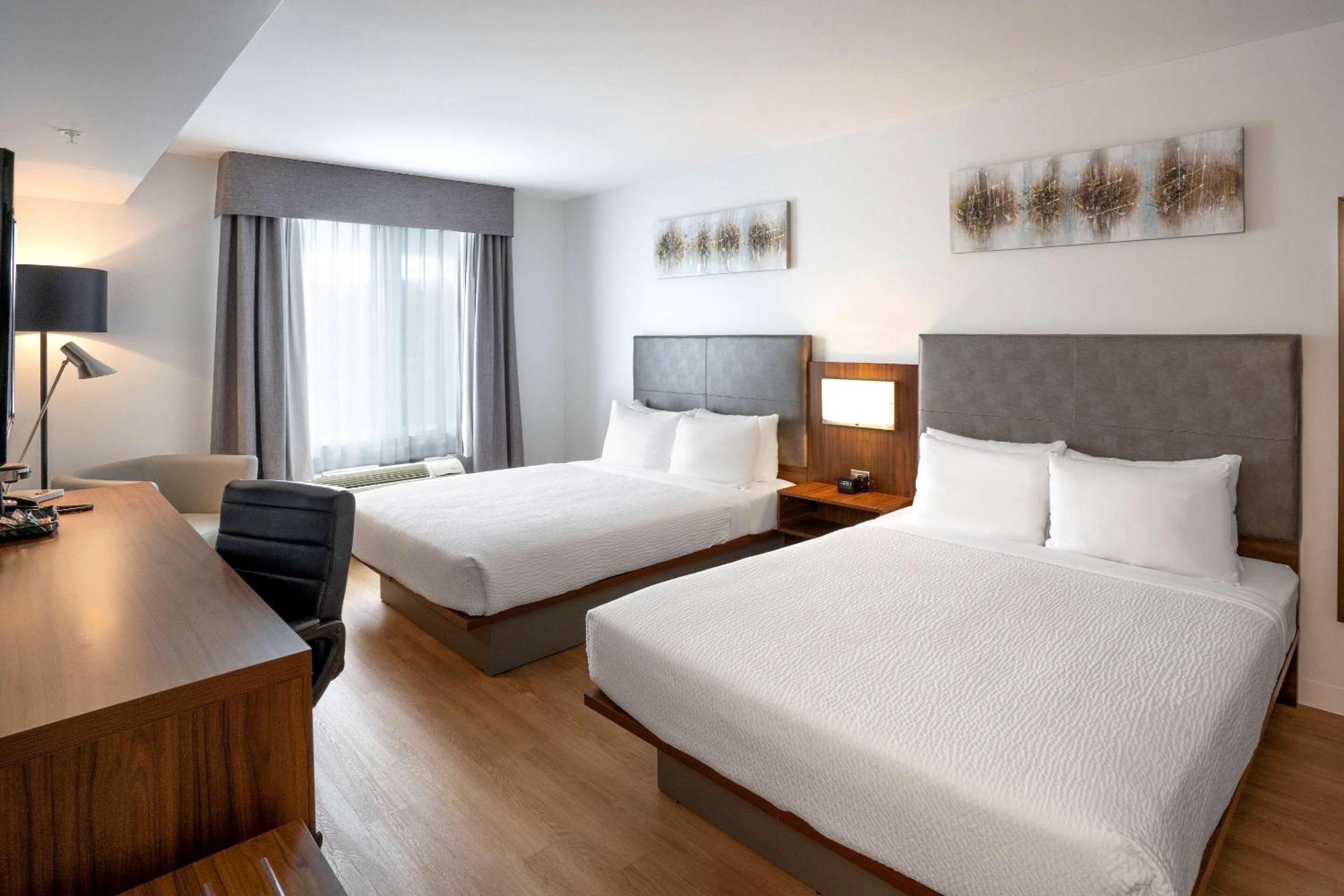 Deluxe Queen Room with Two Queen Beds - Non Smoking/No Pets - Photo 1