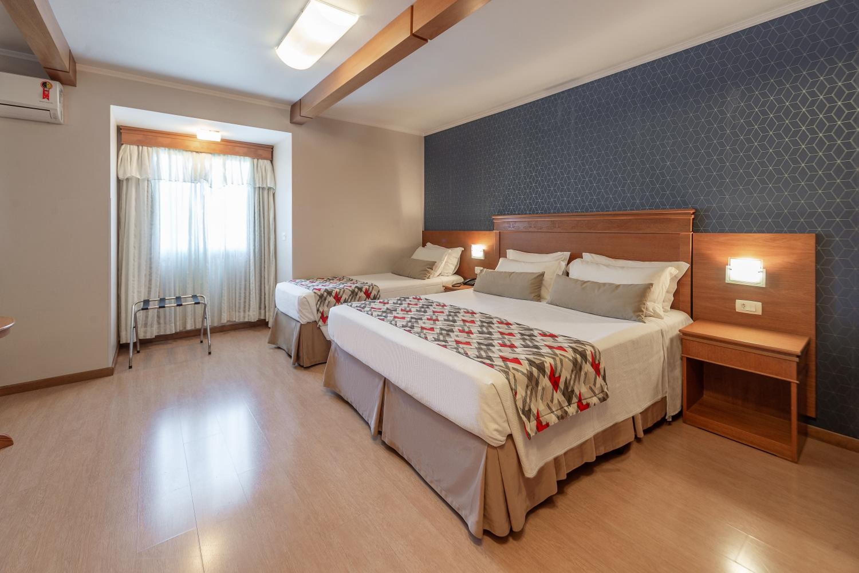 Super Deluxe Triple Room photo 2