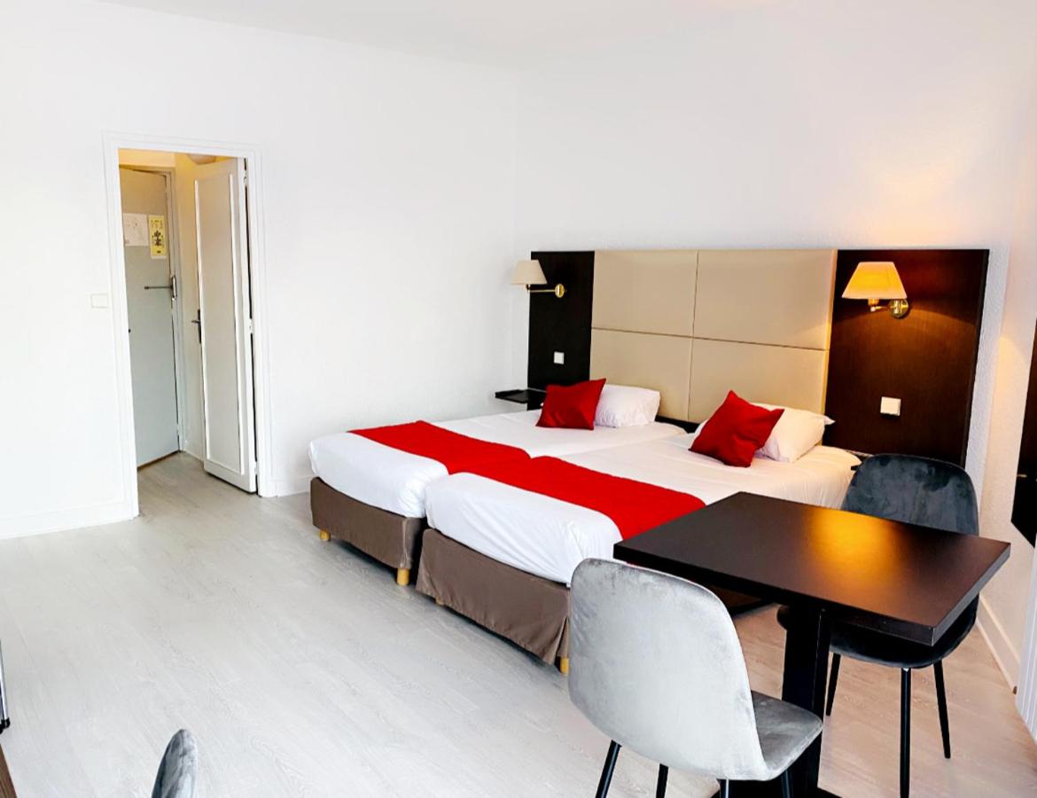 Twin Room - Photo 1