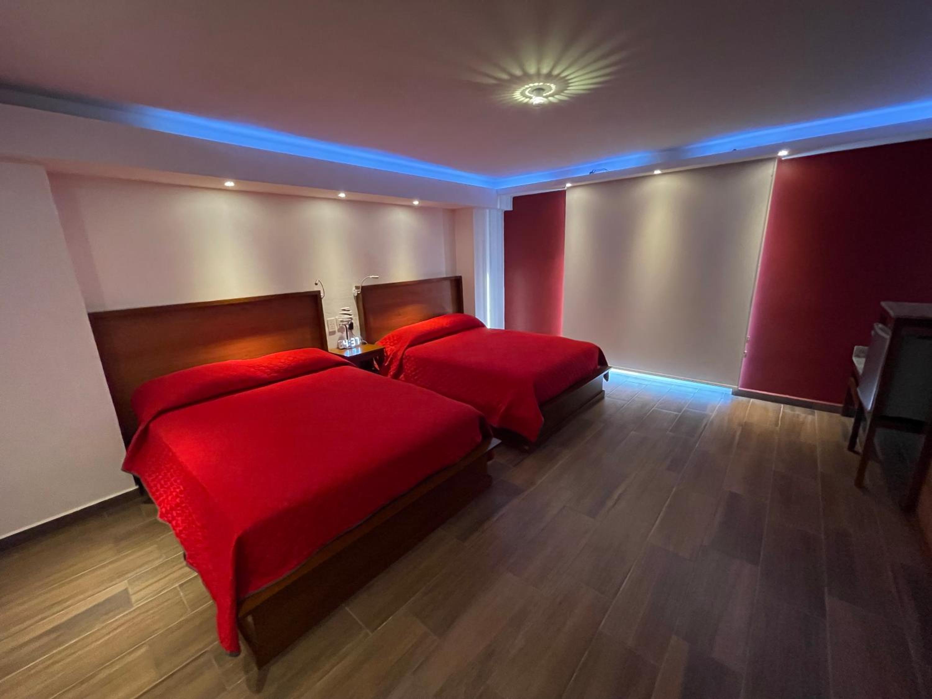 Deluxe Quadruple Room - Photo 20