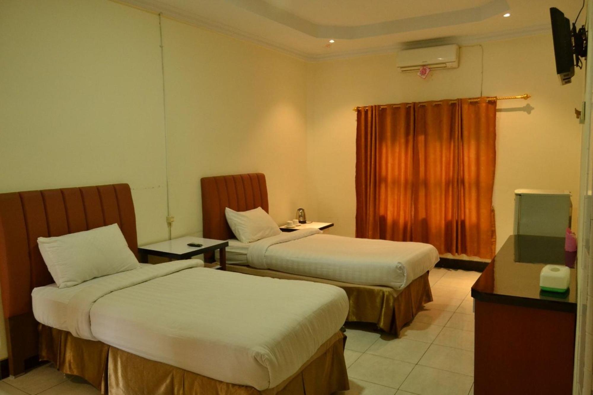 Deluxe Room - Photo 2