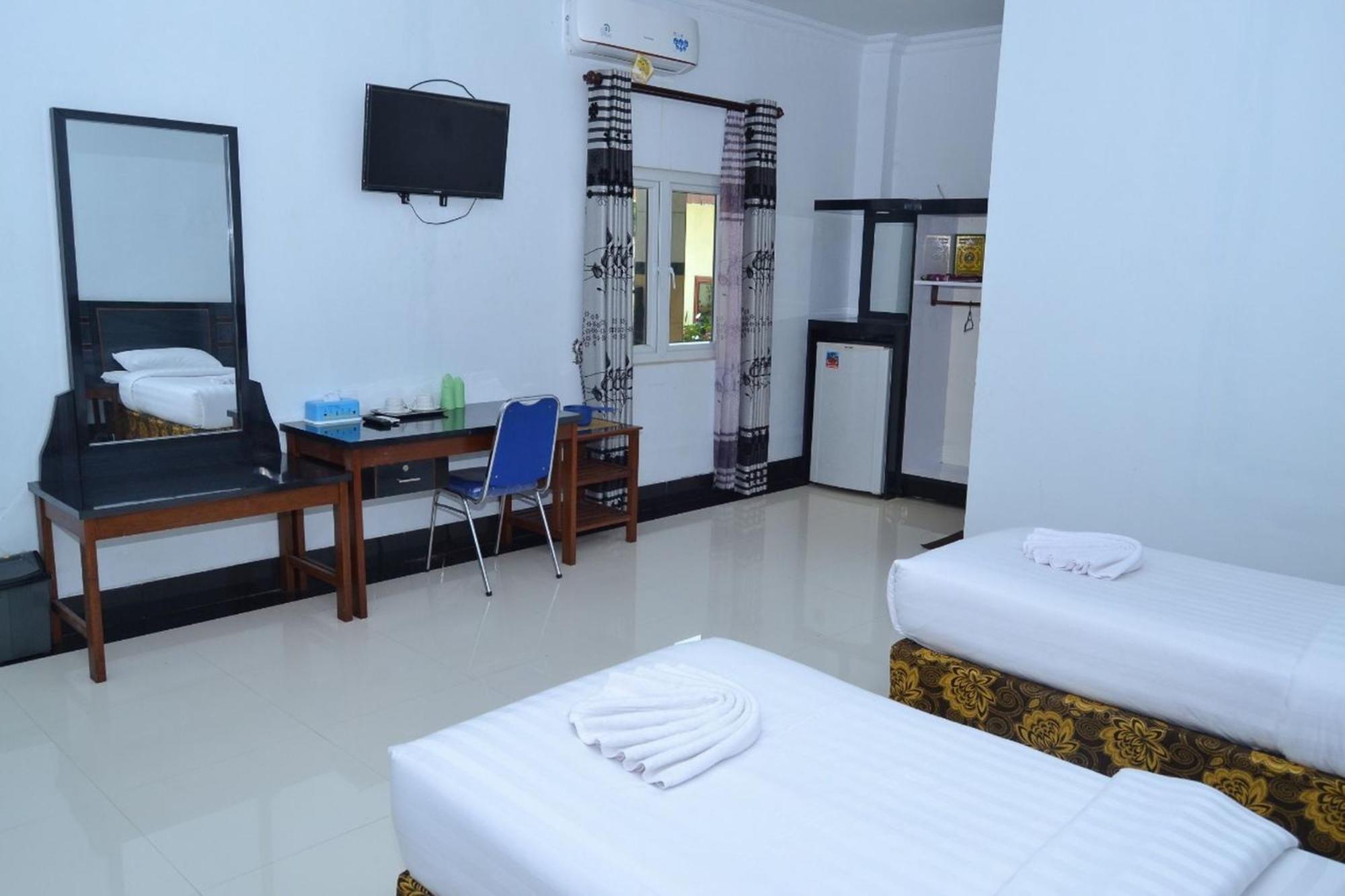 Deluxe Room - Photo 11