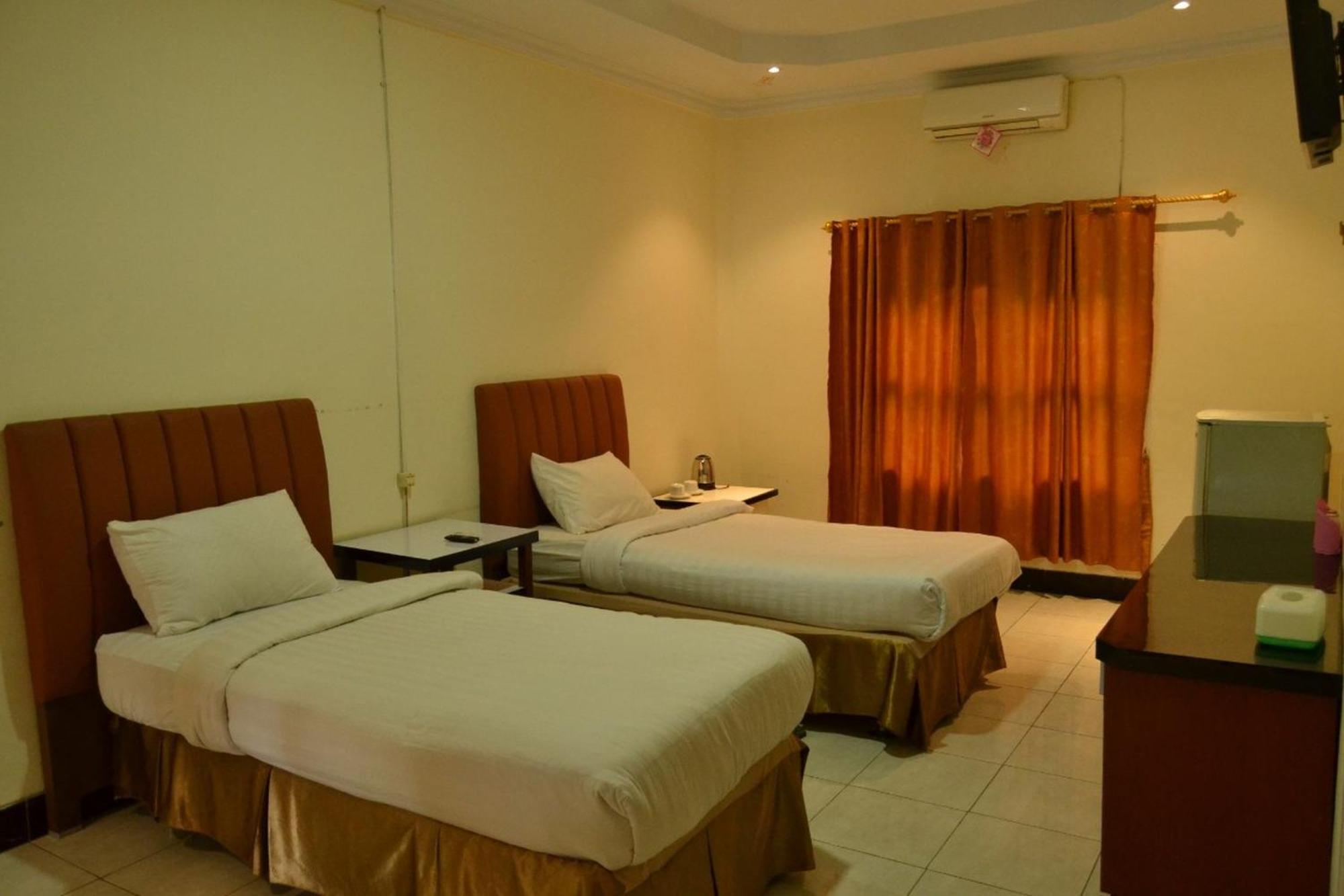 Deluxe Room - Photo 4