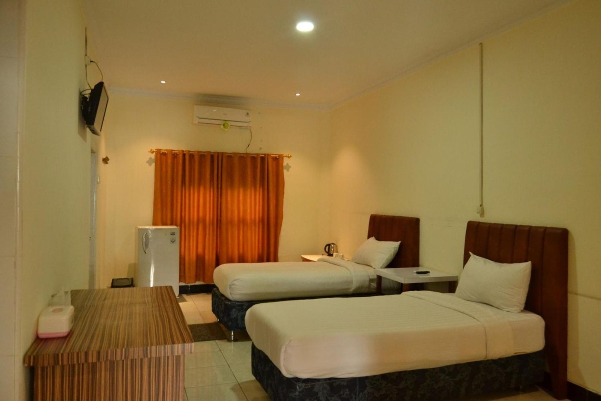Deluxe Room - Photo 13