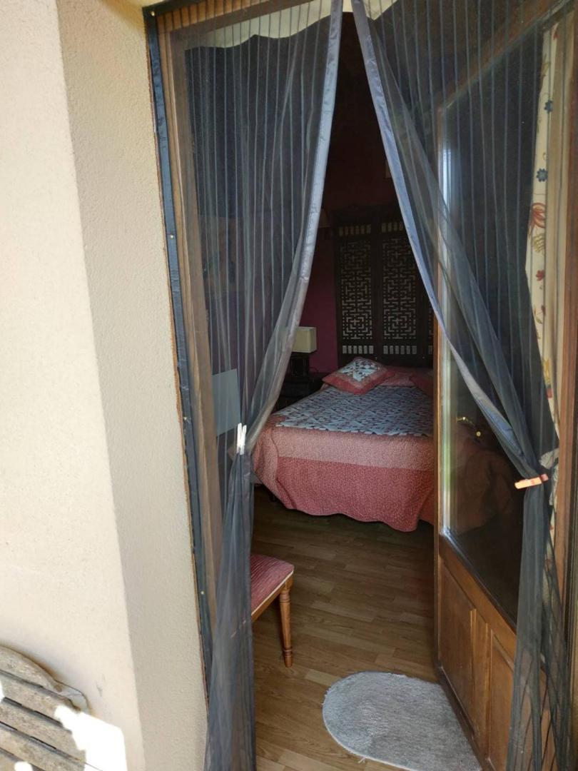 Apartamento de una habitación con vista al jardín