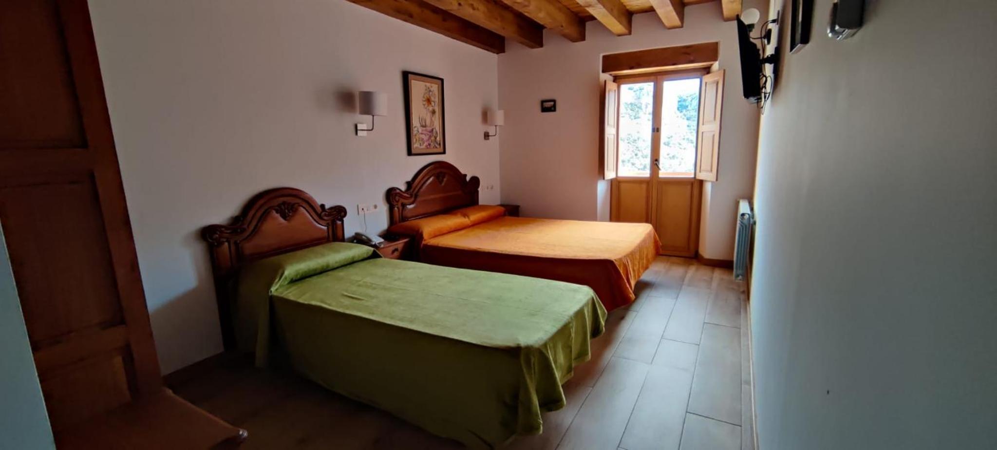 Habitación Doble con Cama Supletoria