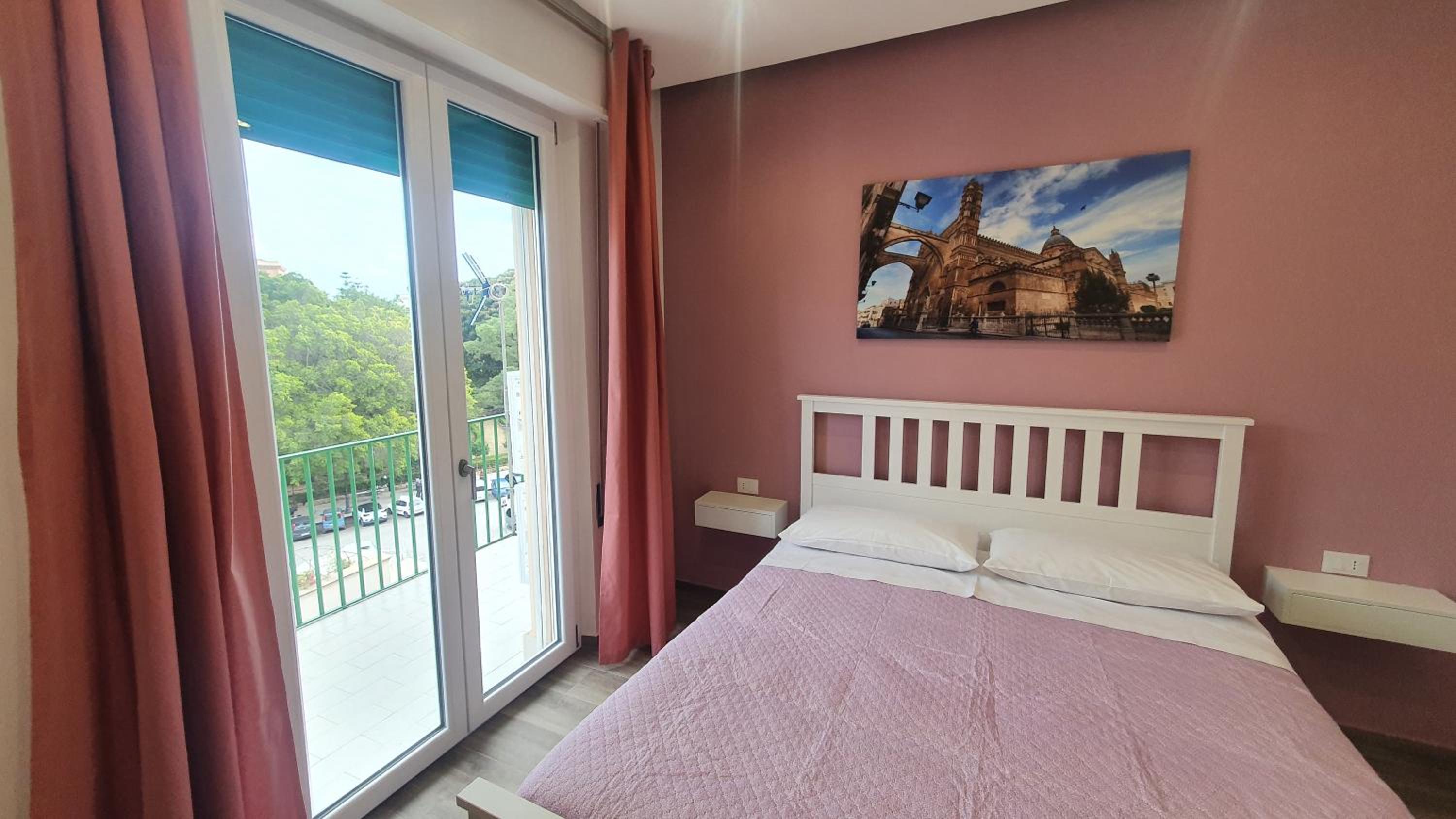 Quadruple Room with Private Bathroom